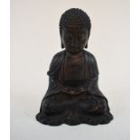 A Chinese bronze Buddha, 24 cm high