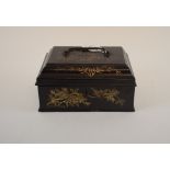 A Japanese lacquer box, 20 cm wide