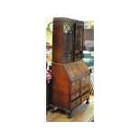 A mahogany bureau bookcase, on dwarf cab