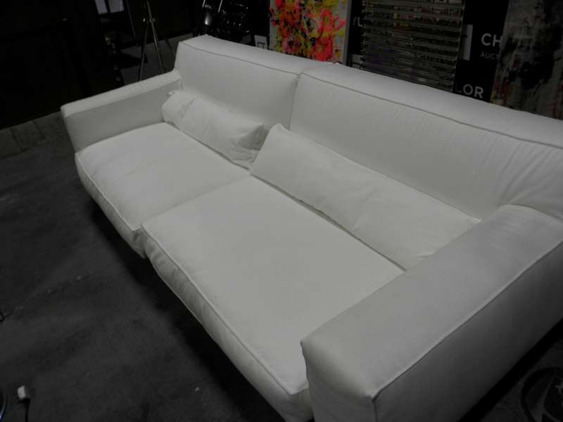 UNBRANDED CREAM UPHOLSTERED 2 SEATER SOFA WITH LUMBER CUSHIONS