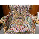 ORNATE TUB CHAIR BELIVED FASHIONED FROM OAK NOT STAINED OR VARNISHED ADORNED AND DECORATED WITH