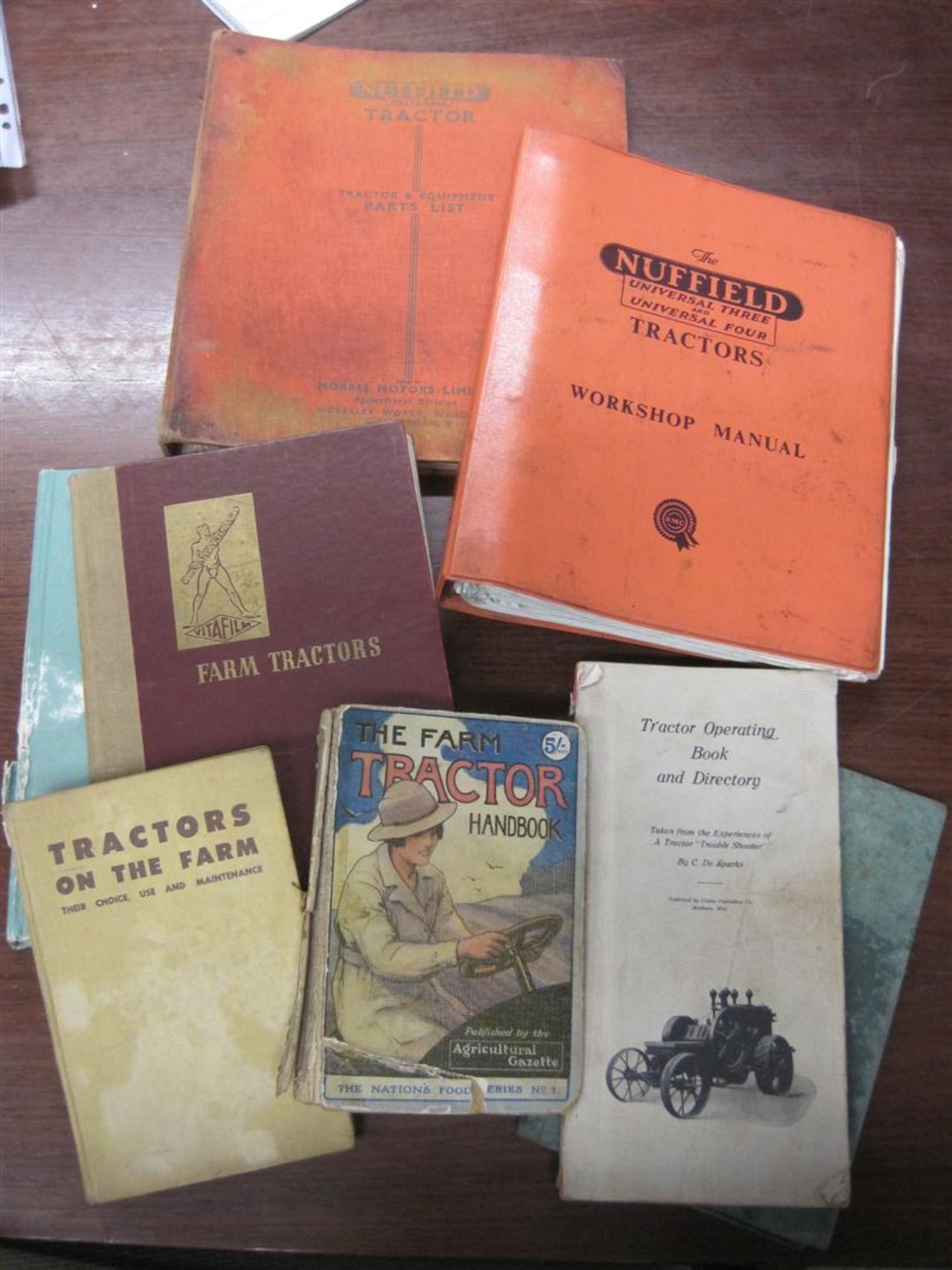 Nuffield Universal 3 & 4 workshop manuals t/w a parts list and a quantity of other books on farm