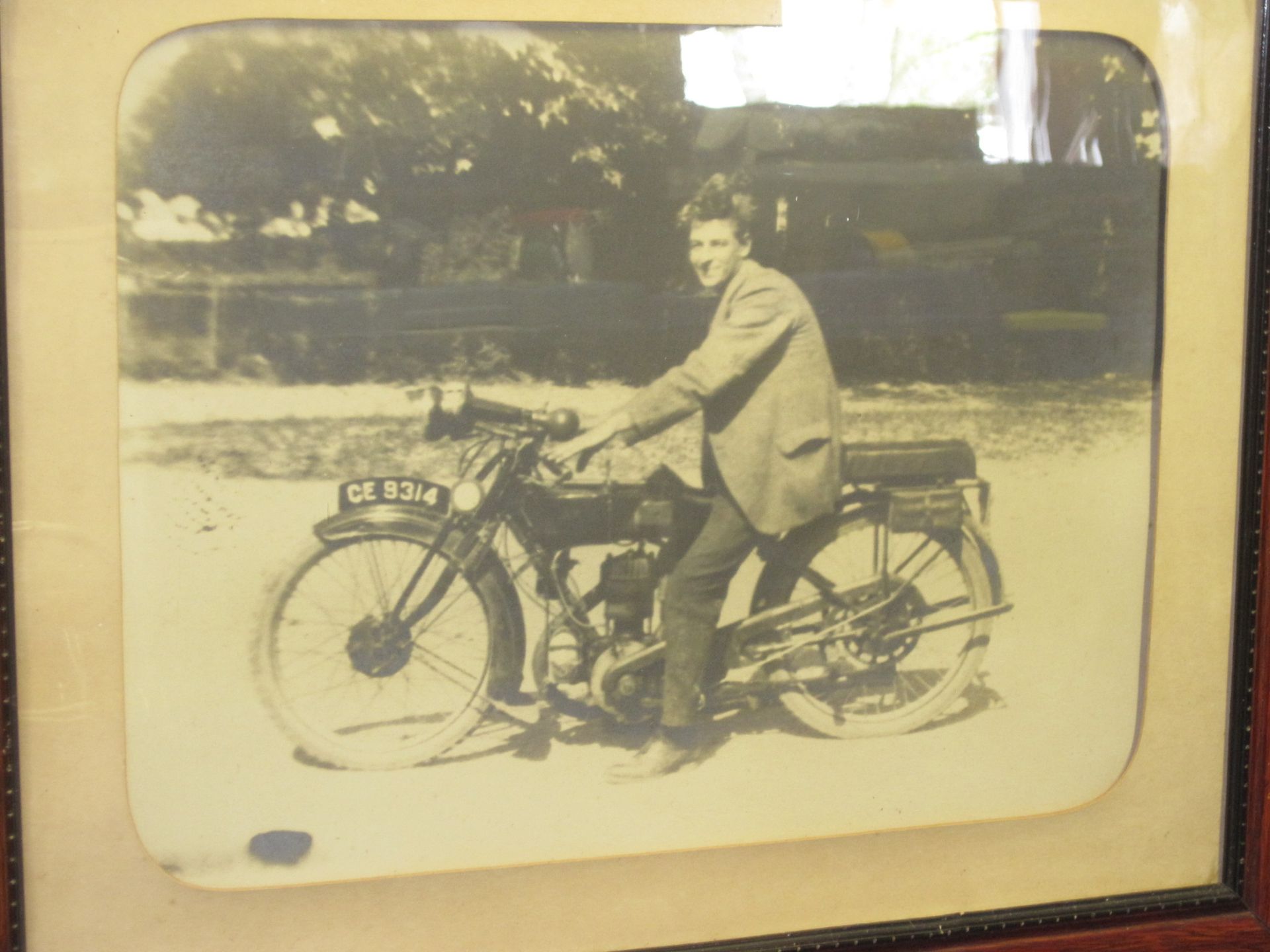 Framed & glazed original photo of a young man on board his AJS (9) CE 9314 (Cambridge Number) 23 x