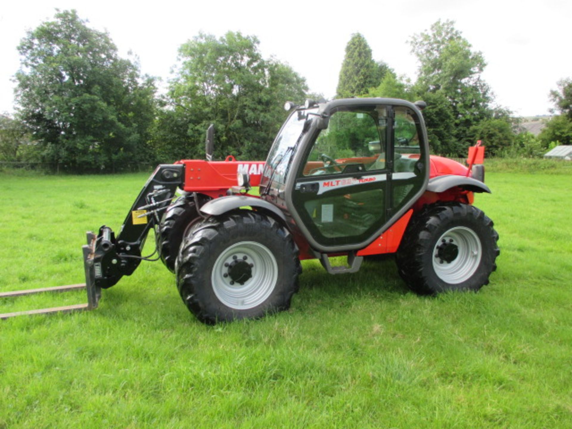 2012 Manitou MLT627 Farm Spec Telehandler with Pallet Forks, Pick Up Hitch, Hydraulic Locking &