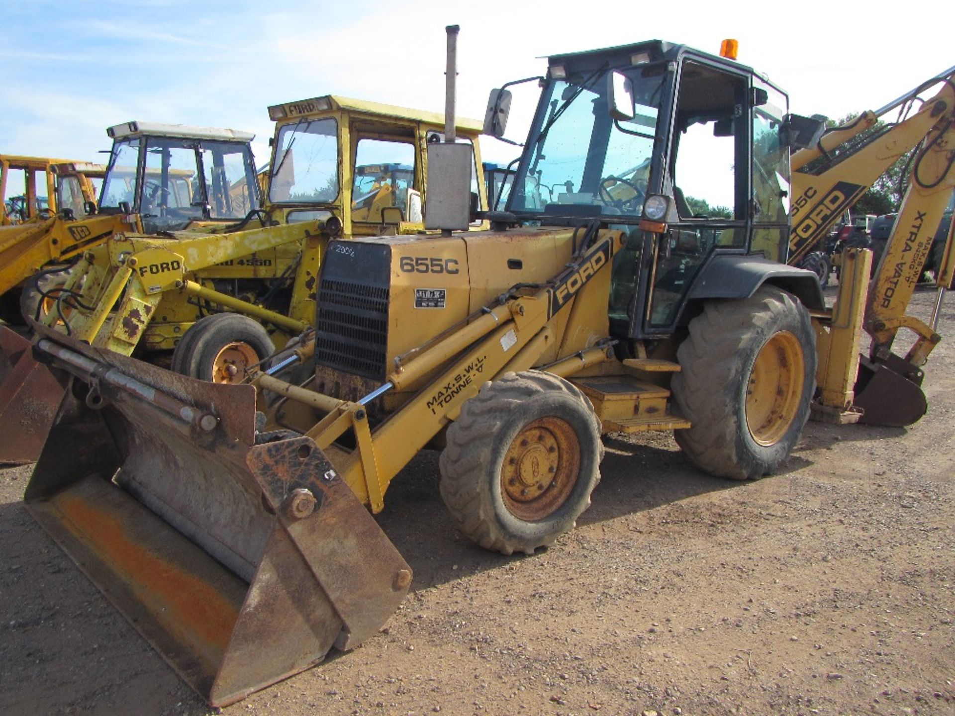 1989 Ford 665C Special 4wd Digger with 4 in 1 Bucket and Extra-Vator Reg. No. G965 FEV Ser No