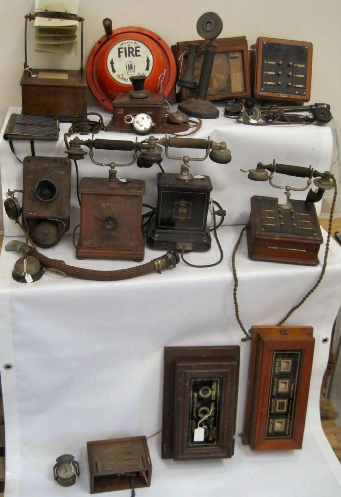 Communication devices to include domestic servant bell indicators & various vintage telephone hand -
