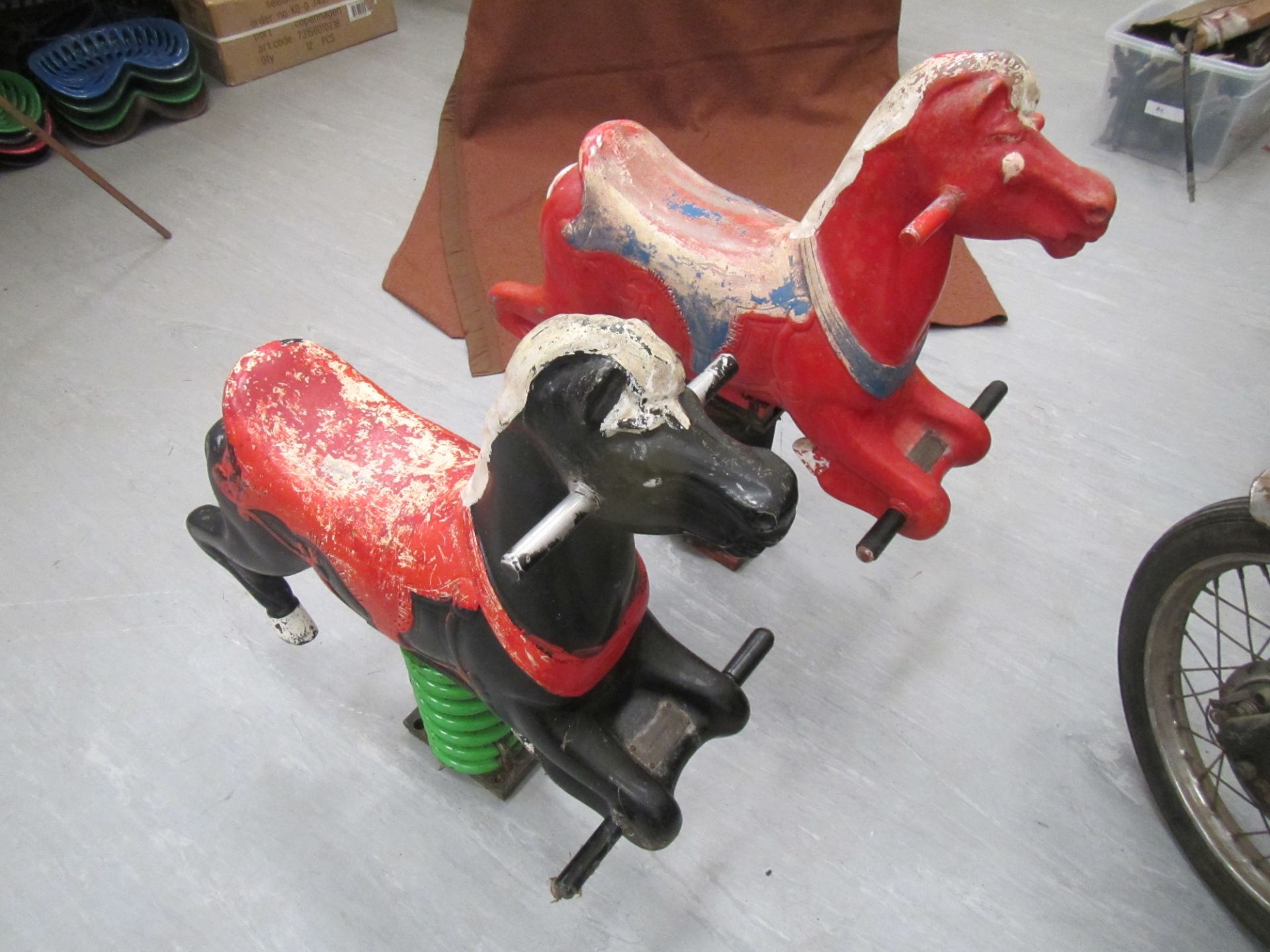 Cast metal playground ride-on horses, spring mounted and produced by Wicksteed leisure,