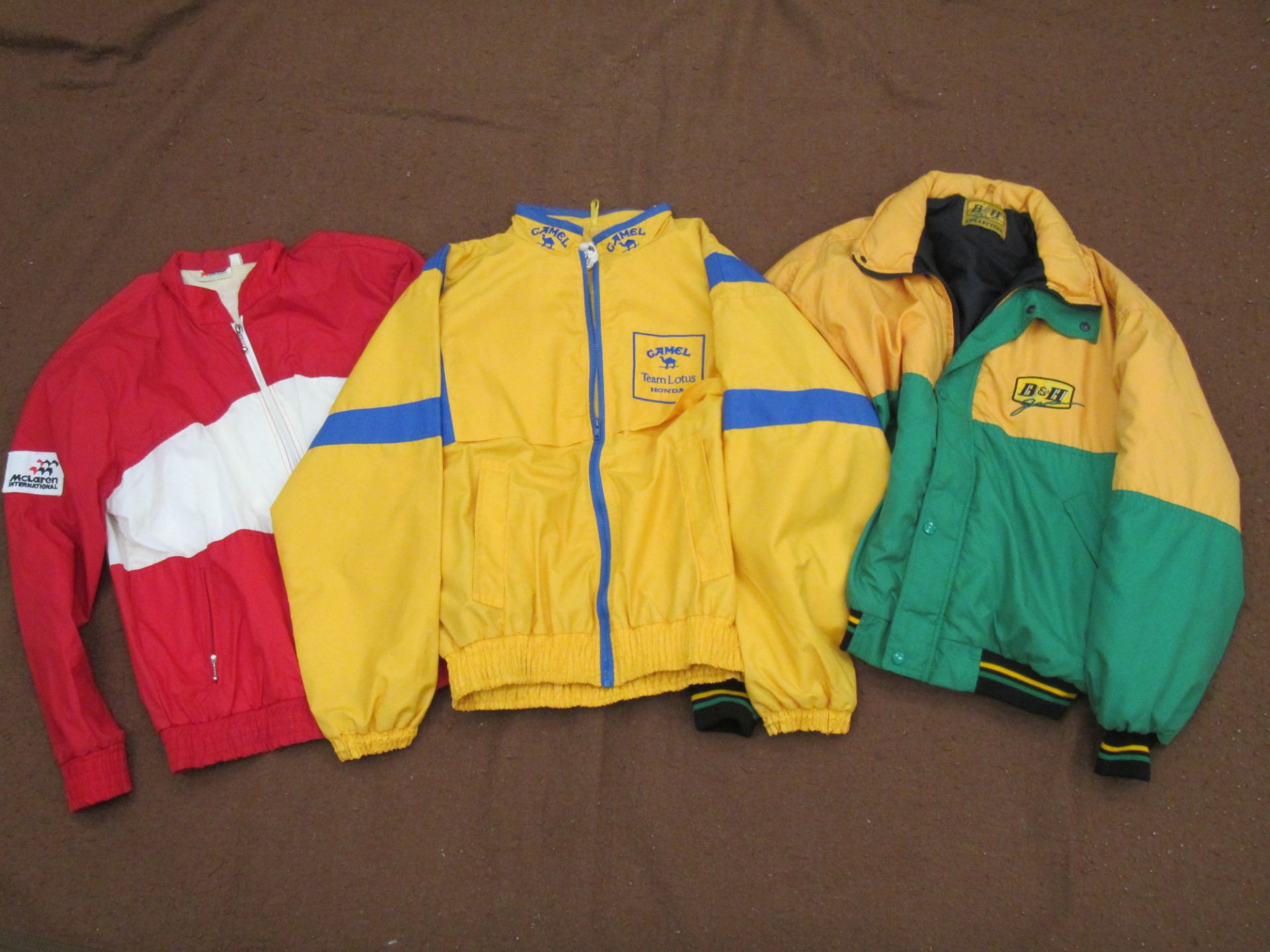 B&H - Jordan, Camel-Team Lotus, Malboro-McLaren, Three F1 team jackets with sponsor logos