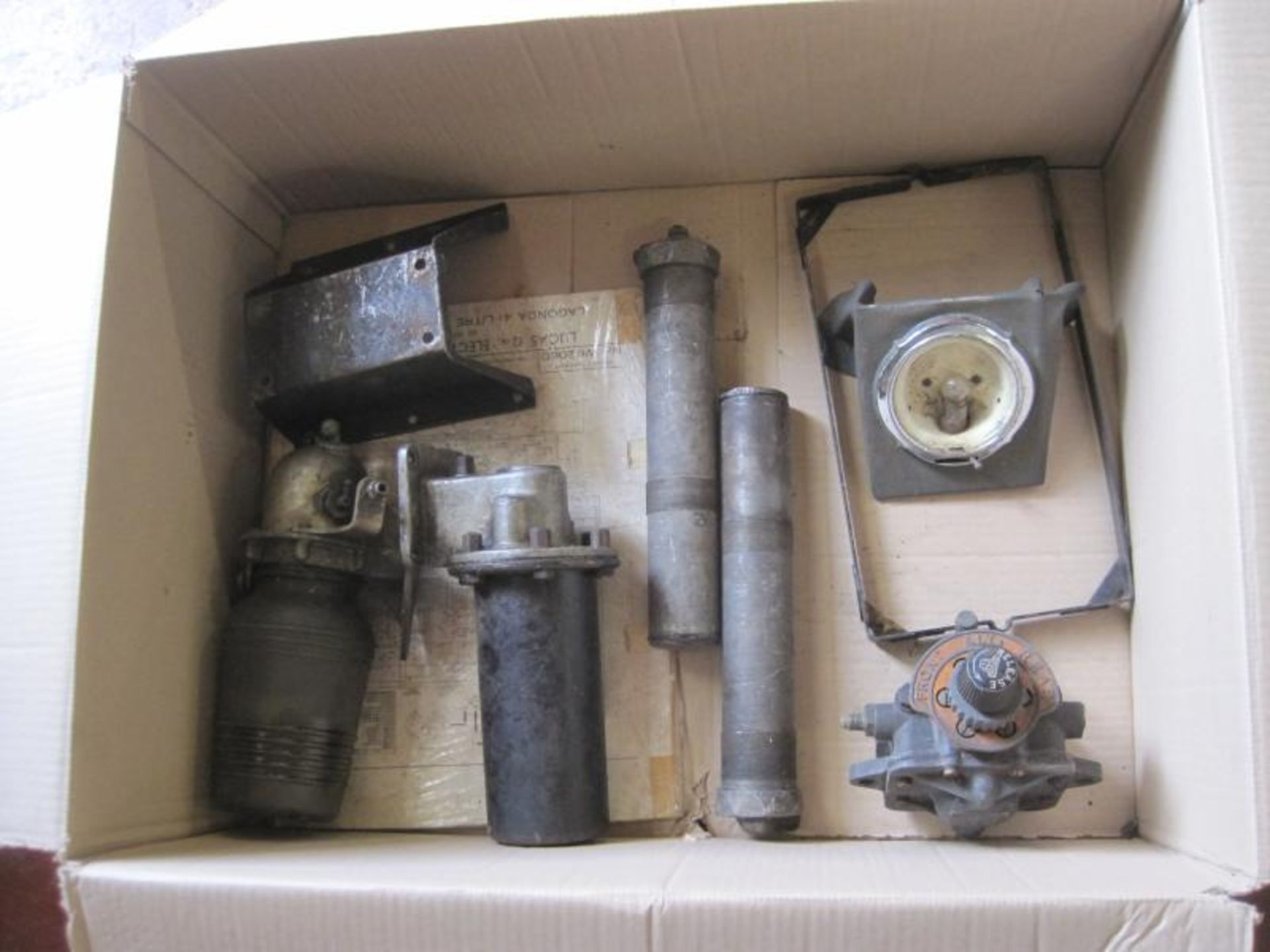 Vintage car spares to include running board, fuel can clamp, glass screen wash bottle etc.