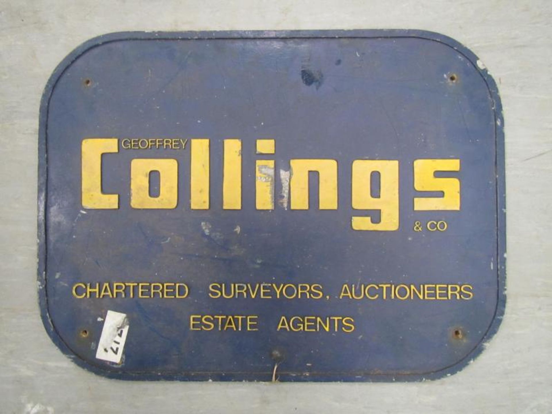 G Collings Chartered Surveyors, Auctioneers, Estate Agents, a cast sign