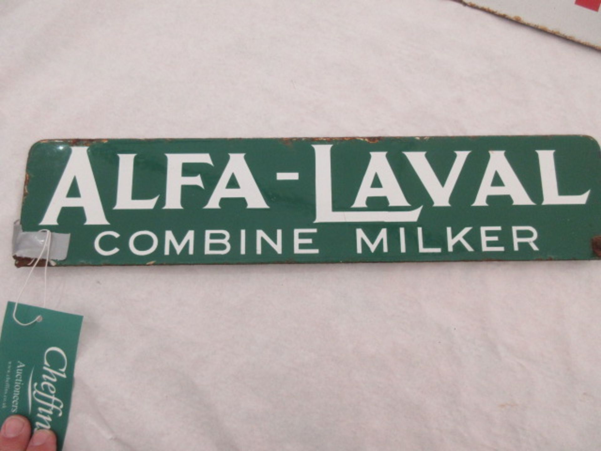 Enamel sign: 'Alfa Laval Combine Milker'