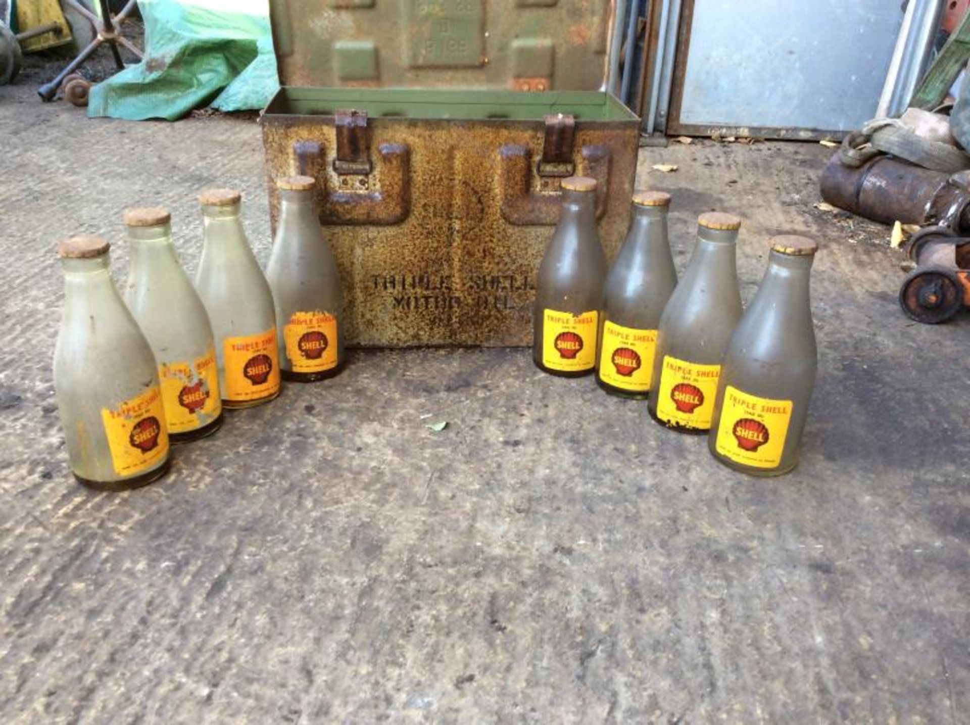 Original Shell Oil tin box marked Tripe Shell Oil containing glass Triple Shell oil bottles (8)