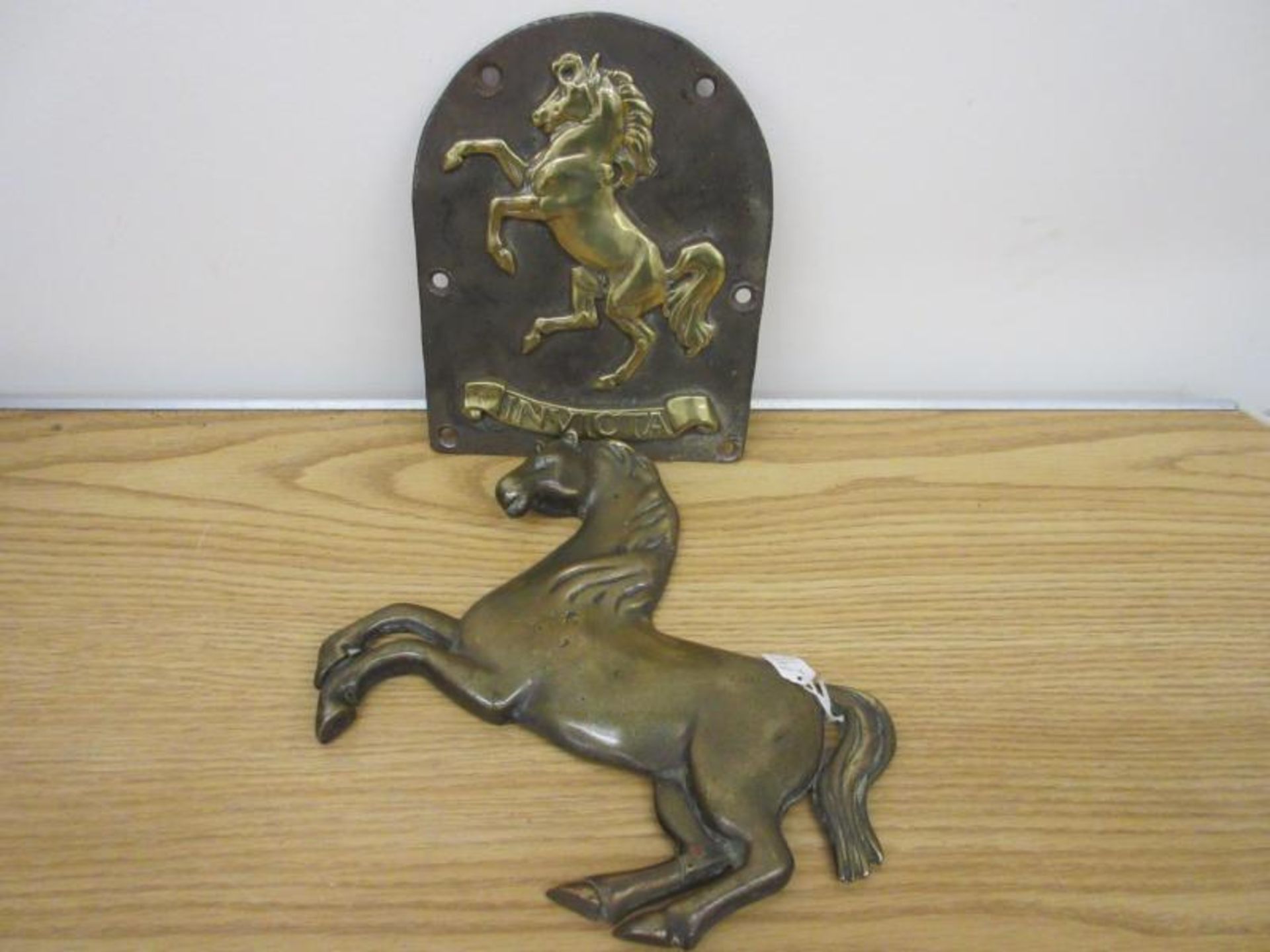 Aveling & Porter Invicta brass prancing horse & a brass horse and scroll mounted