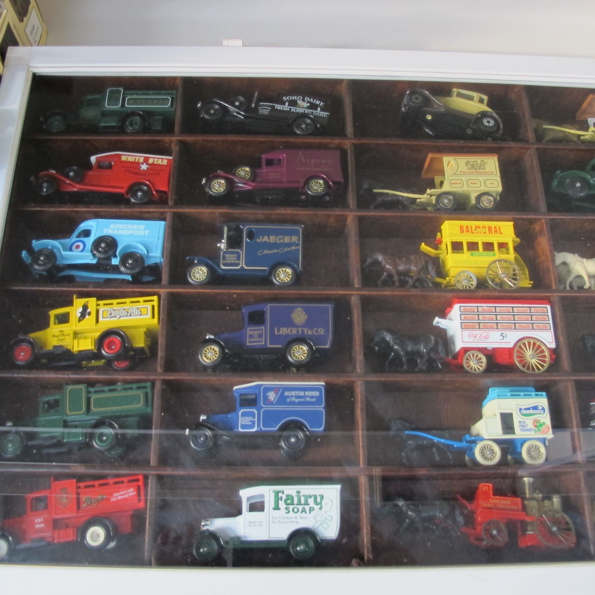 Over seventy die cast model cars, thirty of which are displayed in bespoke case, the remainder are - Image 7 of 11