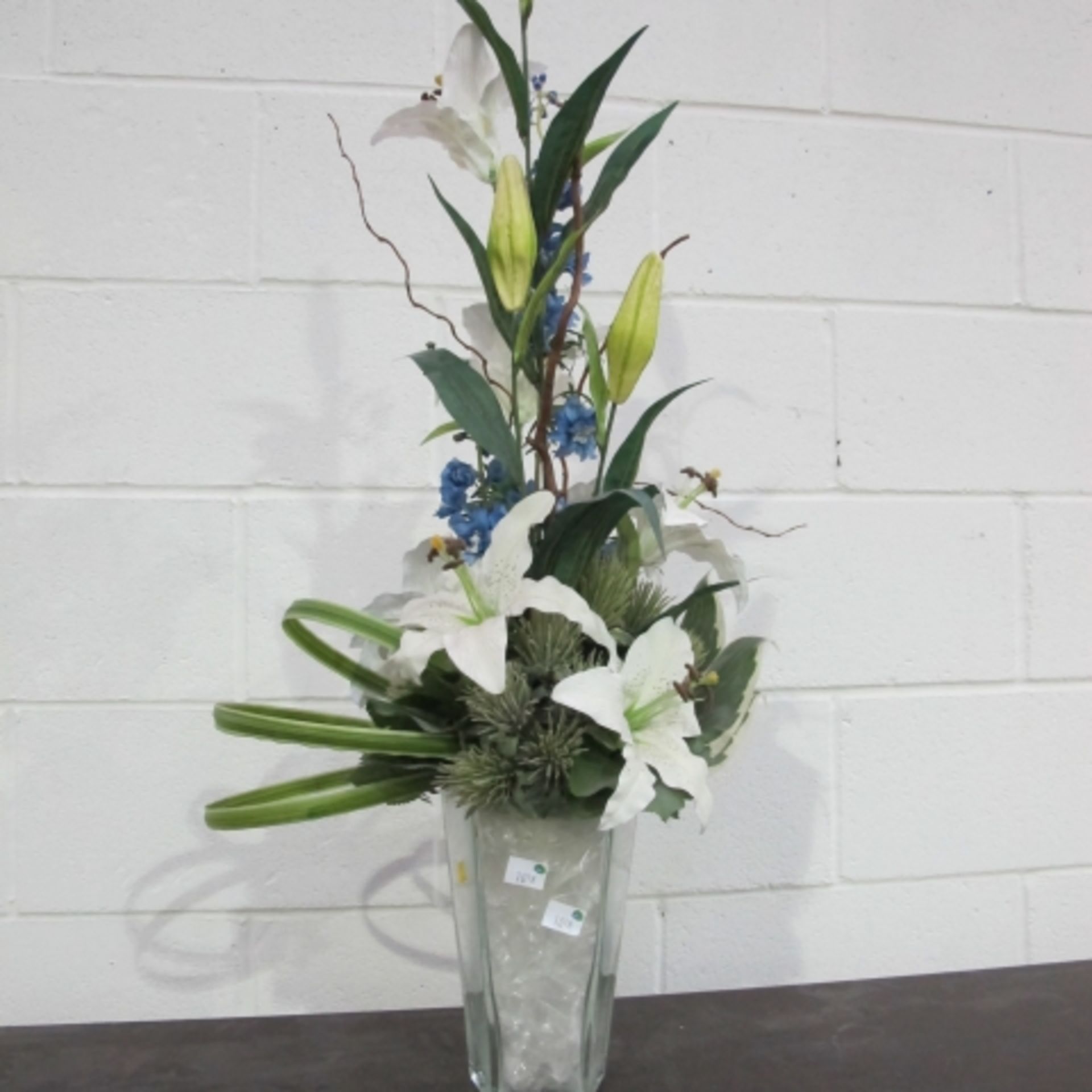 Four artificial Flower displays of various forms and designs (one features  3 new pillar candles) - Image 2 of 4