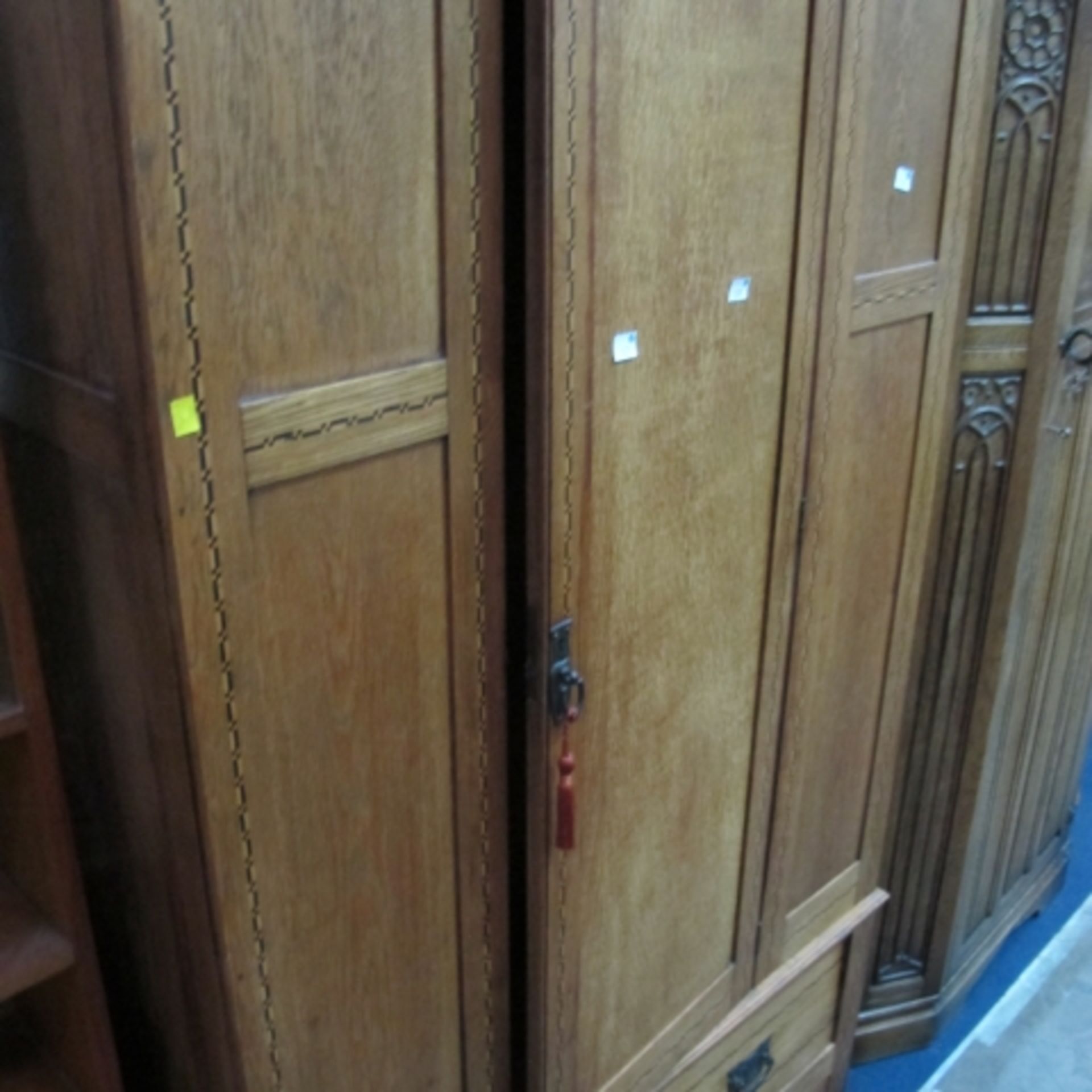 Inlaid panel wardrobe, the ¾ height wardrobe has fitted rails and hooks behind a mirrored door,