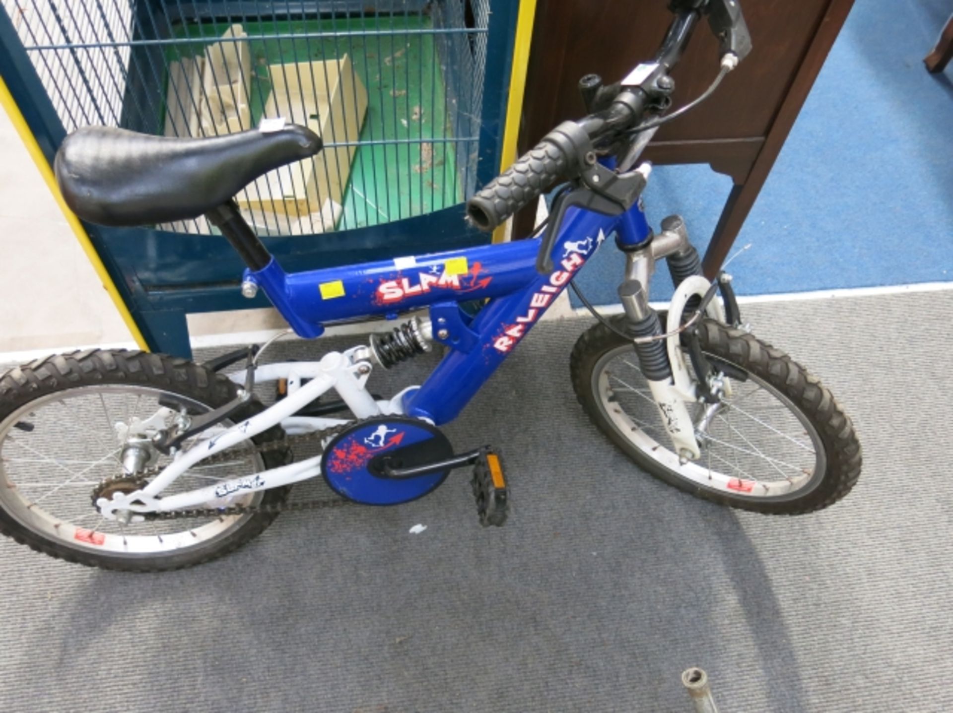 A small child's Raleigh Slam bicycle (est £20-£40)