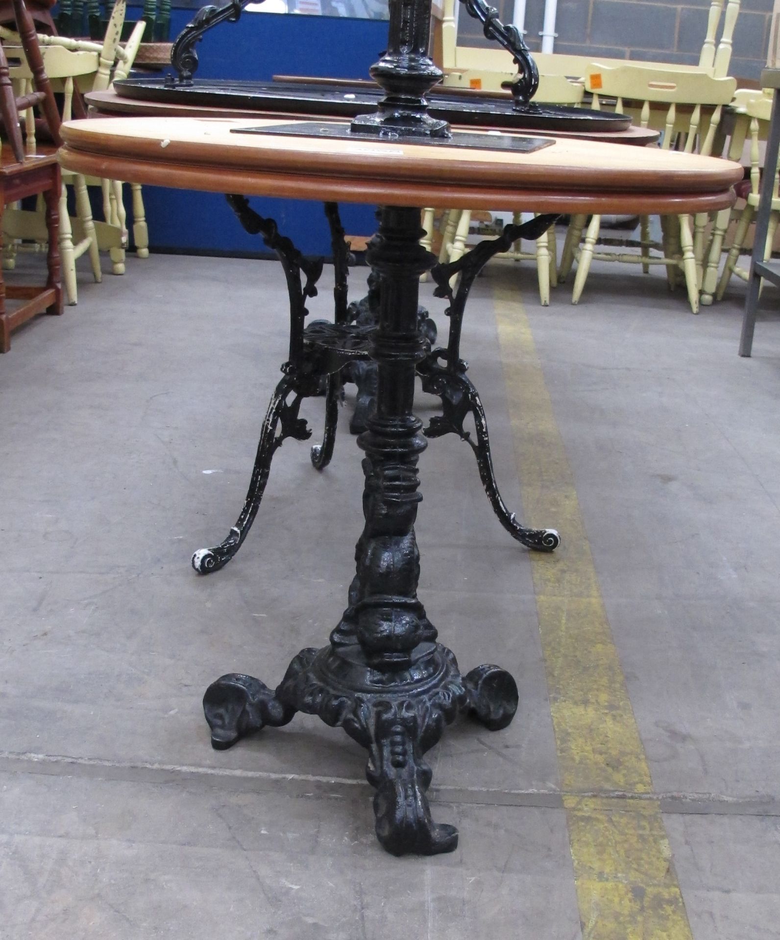 * 7 x various wood and cast iron circular cafe tables. Please note there is a £5 + VAT Lift Out - Image 2 of 2