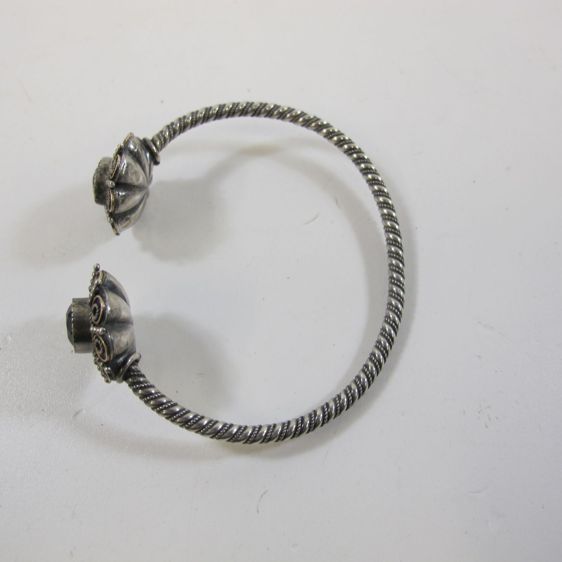 Antique Amethyst Set Torque-style Silver Bracelet (est £30-£60)