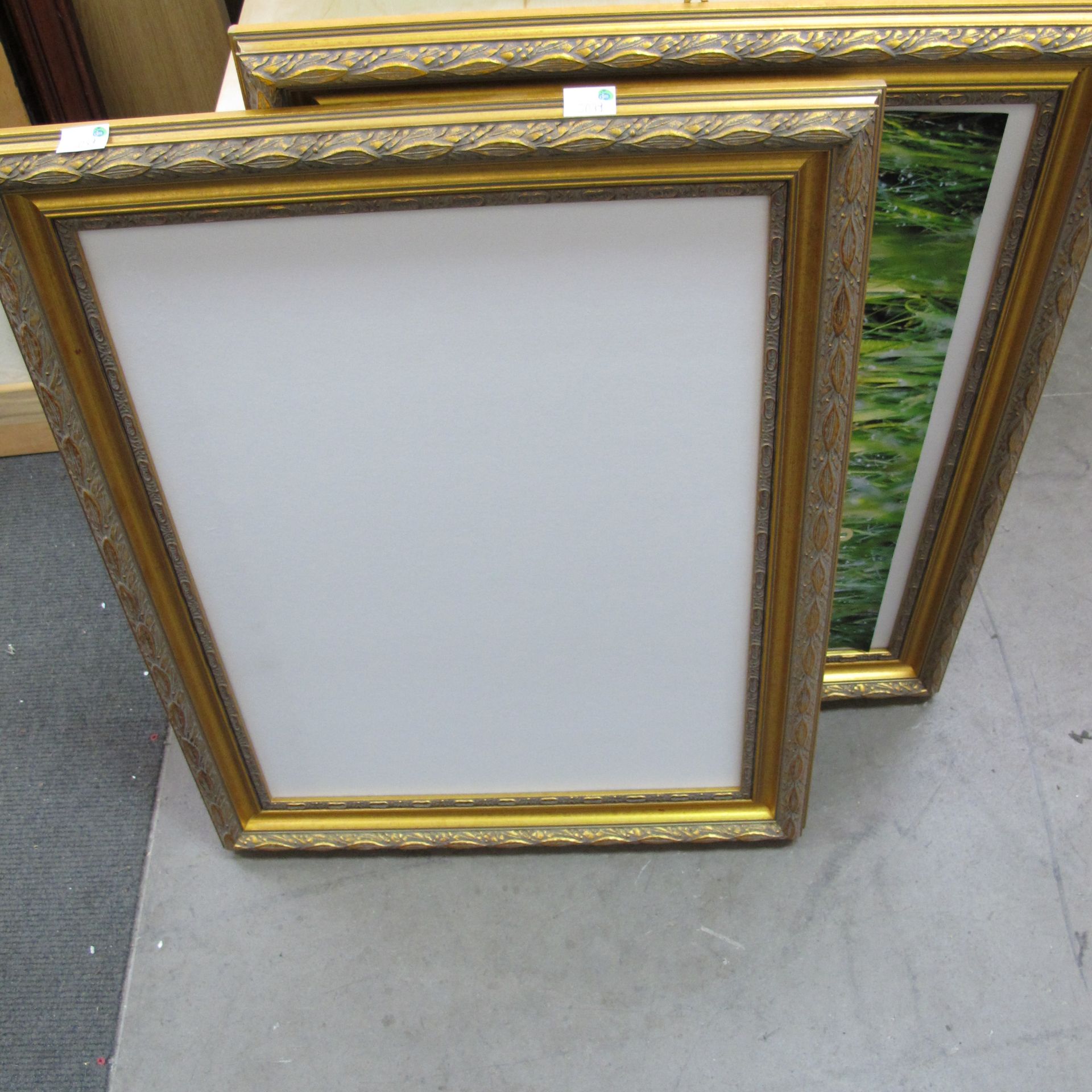 * A lot to contain 2 x blank picture frames (72cm x 57cm frame, 59cm x 44cm picture) and a white
