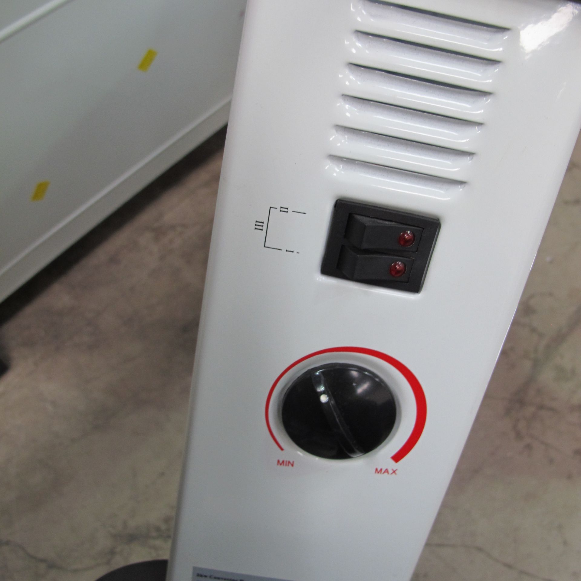 * A lot to include 2 x electric heaters and a Holmes rotating fan (approx 65cm) - Image 4 of 5