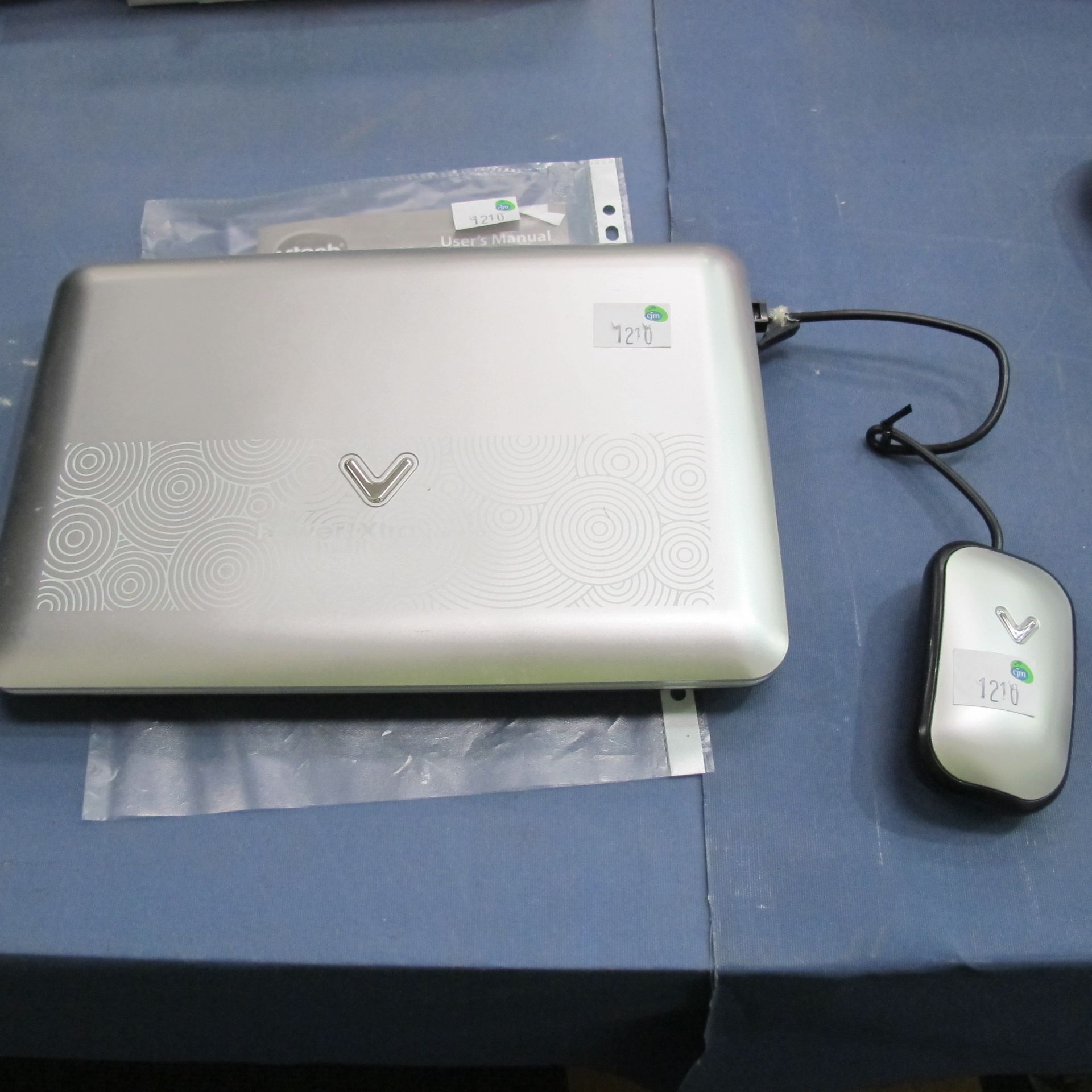 A VTech power Xtra Laptop with mouse and instructions (est £20-£40)