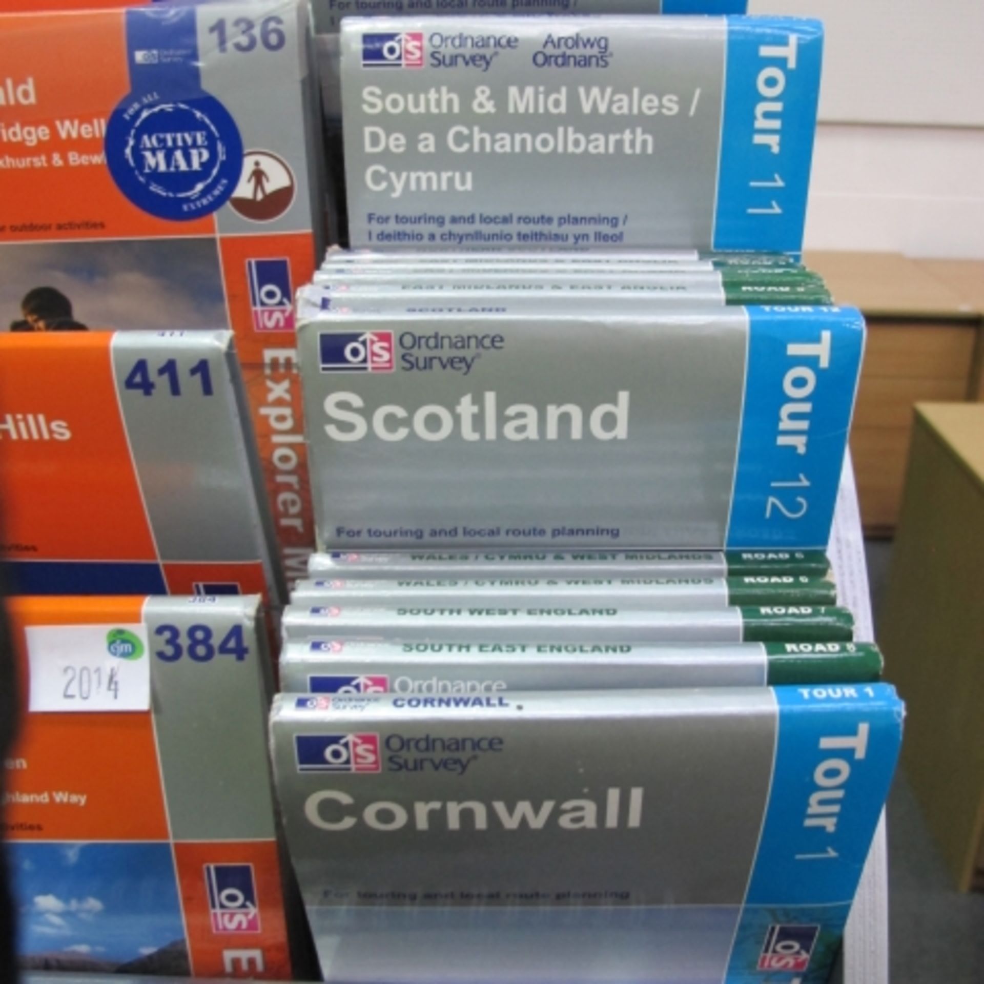 2 x Bespoke Display stands with a lower integral shelf for Ordnance Survey Maps, on castor wheels. - Image 5 of 11