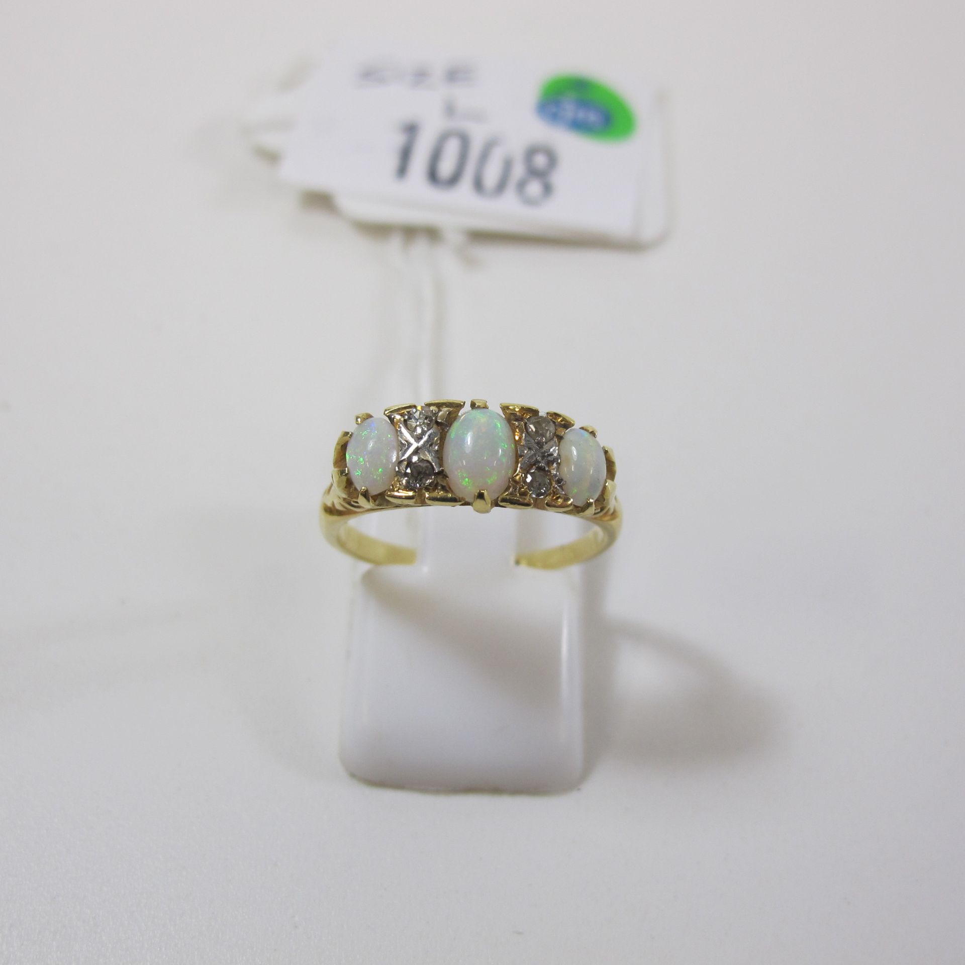 An 18ct gold vintage opal and diamond ring, size L (est £300-£600)