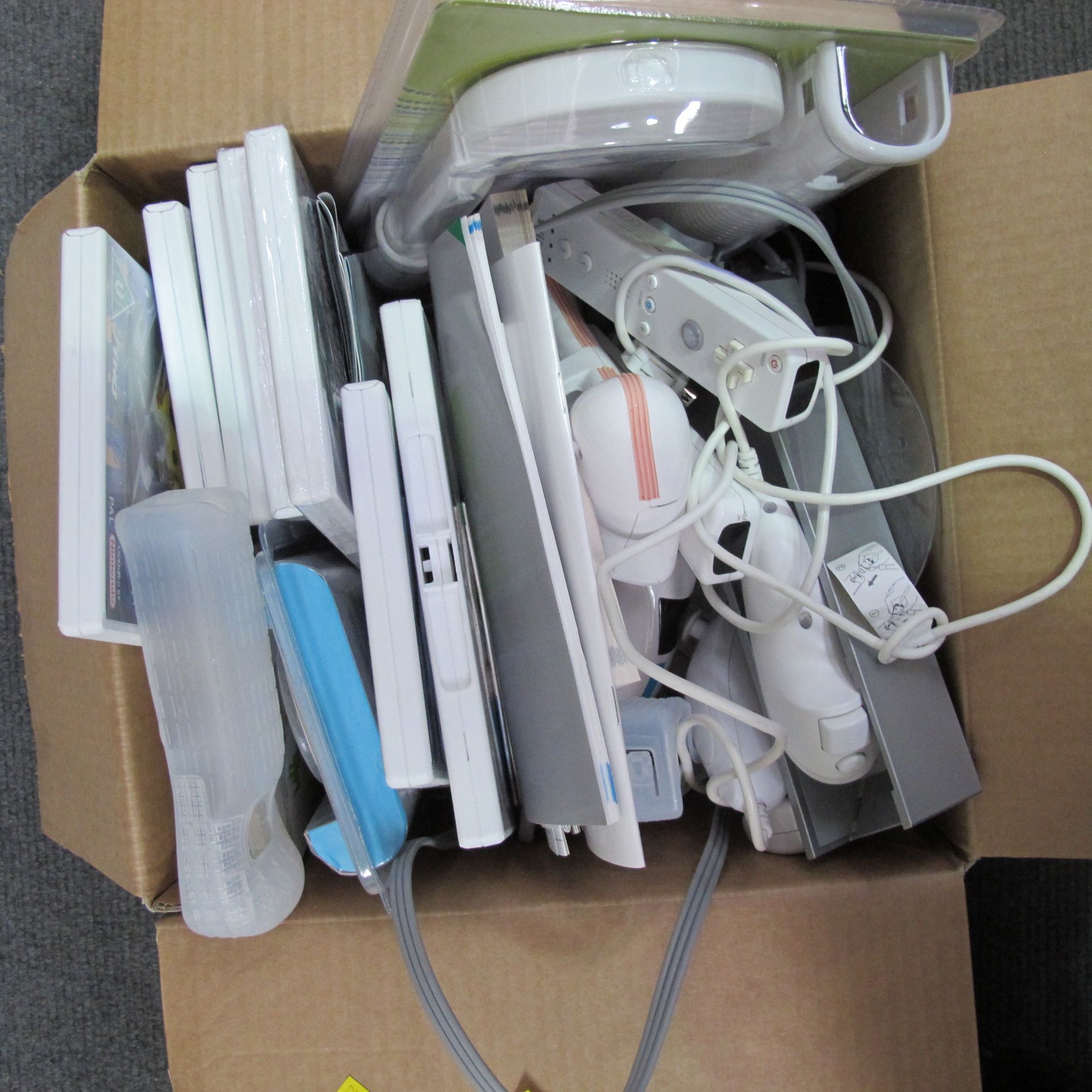 A lot to include a Nintendo Wii handheld remote, nunchucks, various accessories, Wii Fit board and - Image 2 of 7