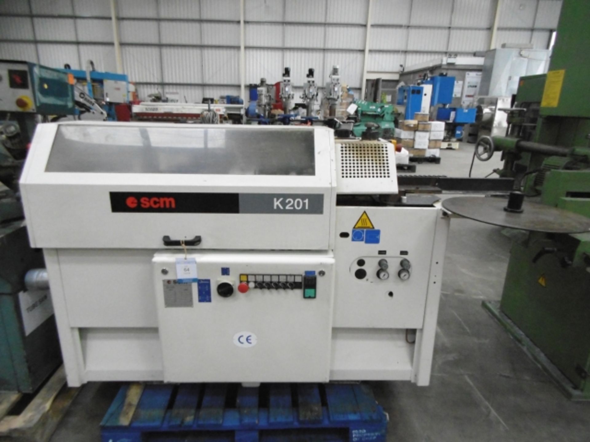 * SCM Model K201 Edge Bander; 3 phase; number W.D E-K10020; serial number AH/105121. Please note