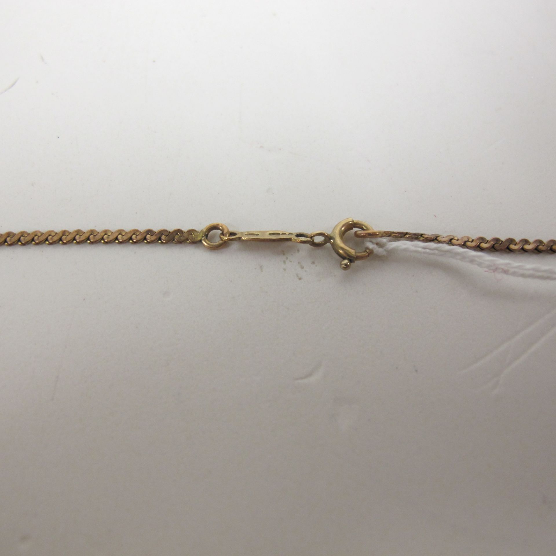 A 9ct gold oval diamond set small pendant on chain, together with two further fine chains (est £ - Image 3 of 8