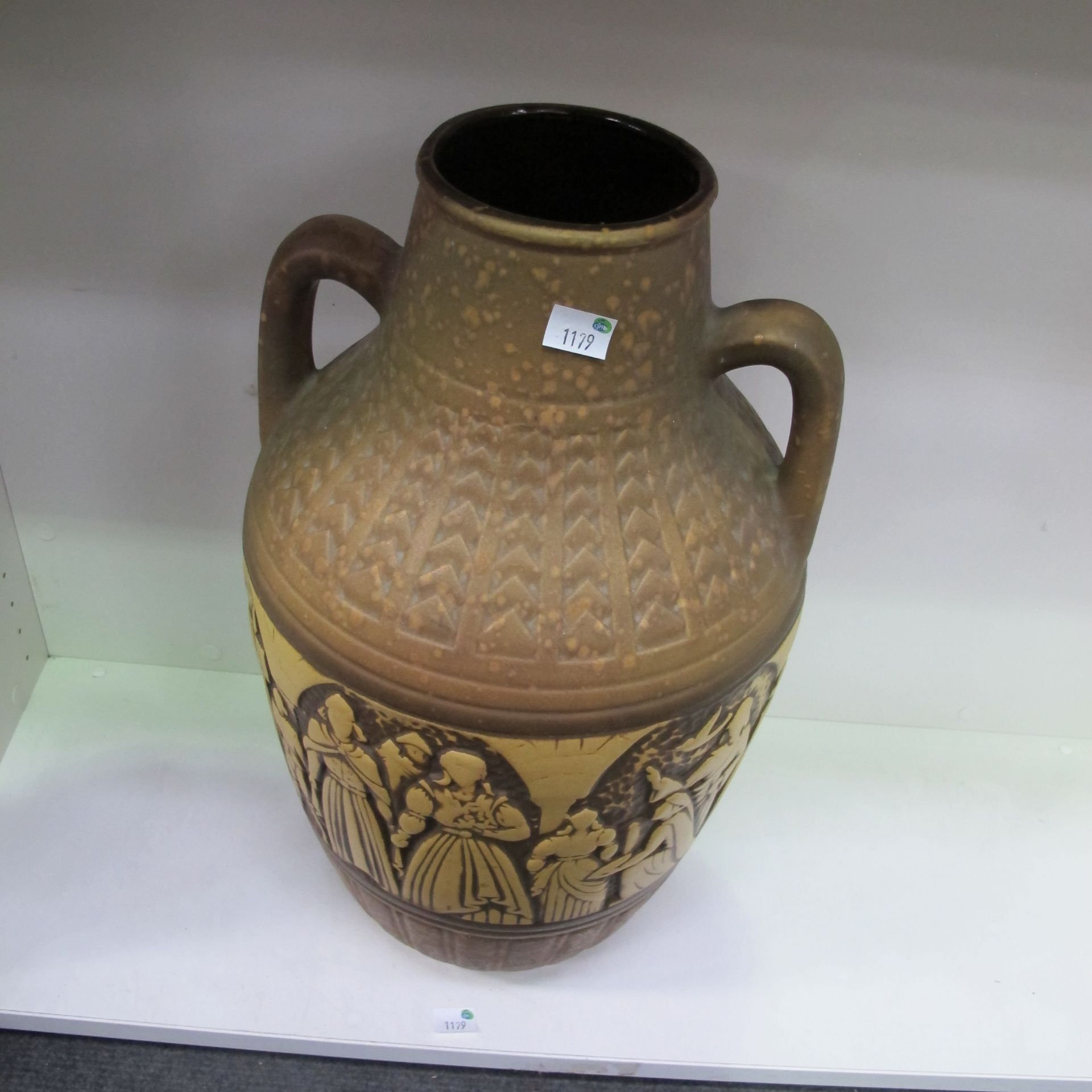 A large, tall two-handled stoneware jar (H60cm, diameter 20cm) (est £20-£30)