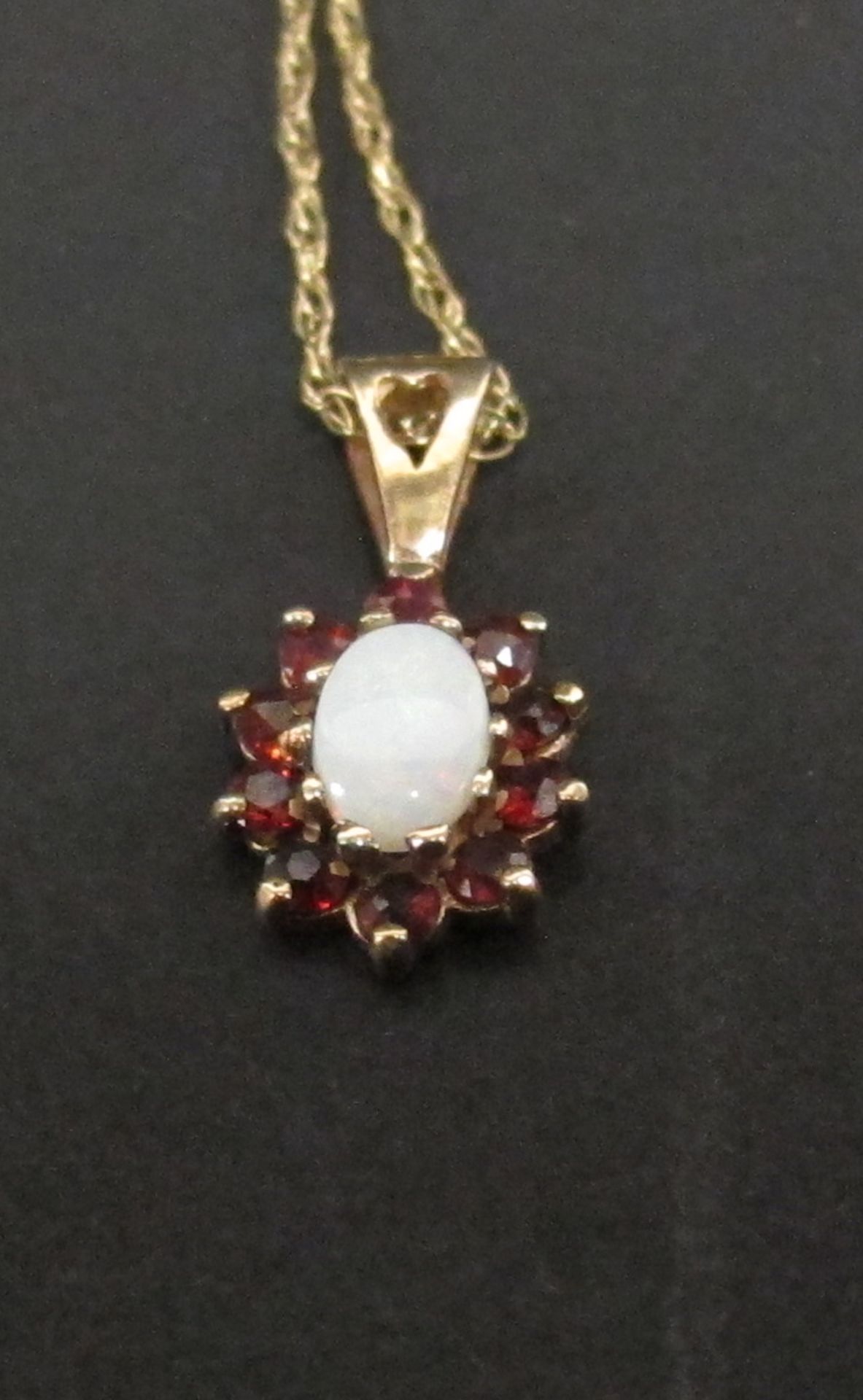 9ct gold, opal and garnet pendant on 9ct gold chain (est £30-£60) - Image 3 of 3