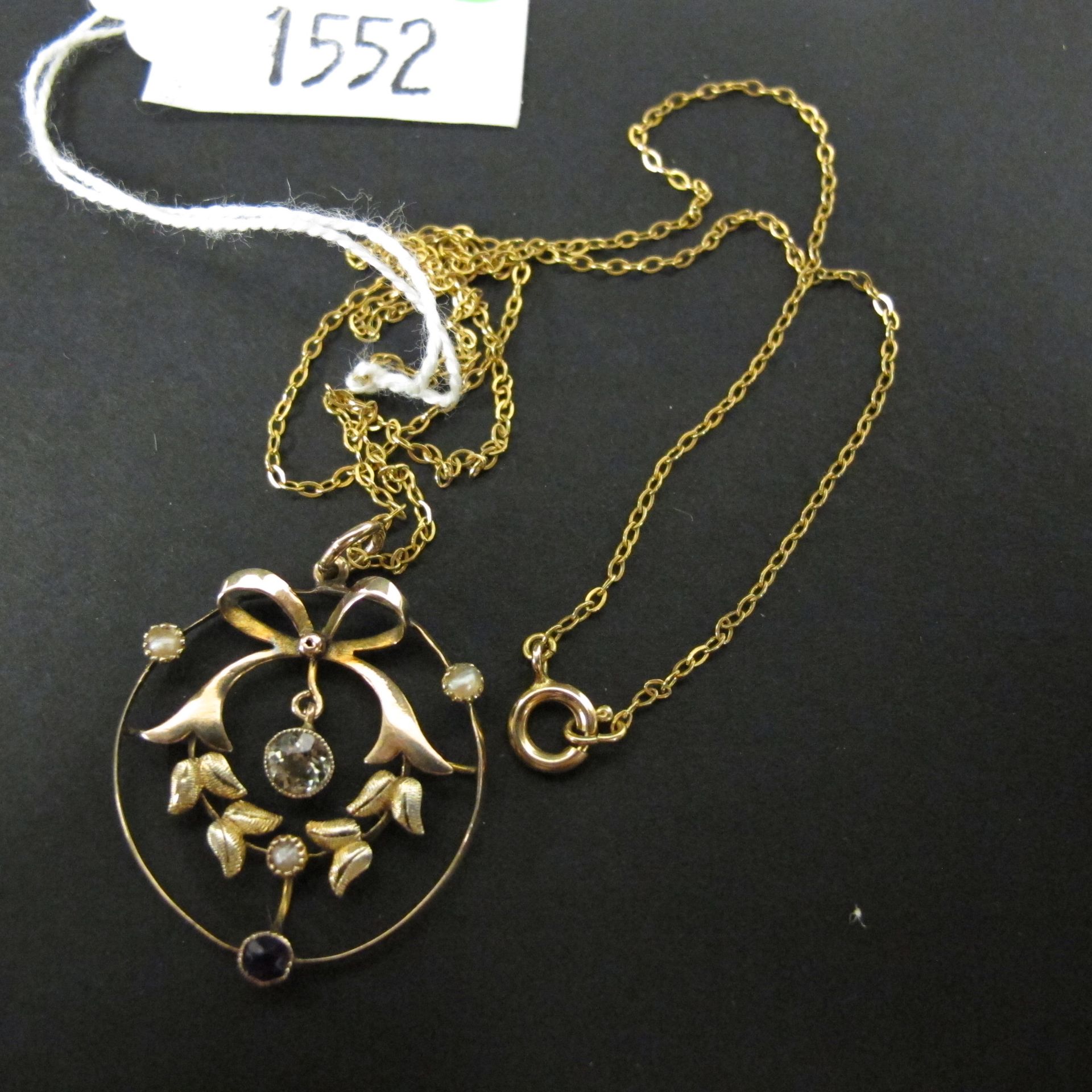 Antique 9ct gold pendant and chain in Suffragette colours (peridot, pearl and amethyst) (est £100-£