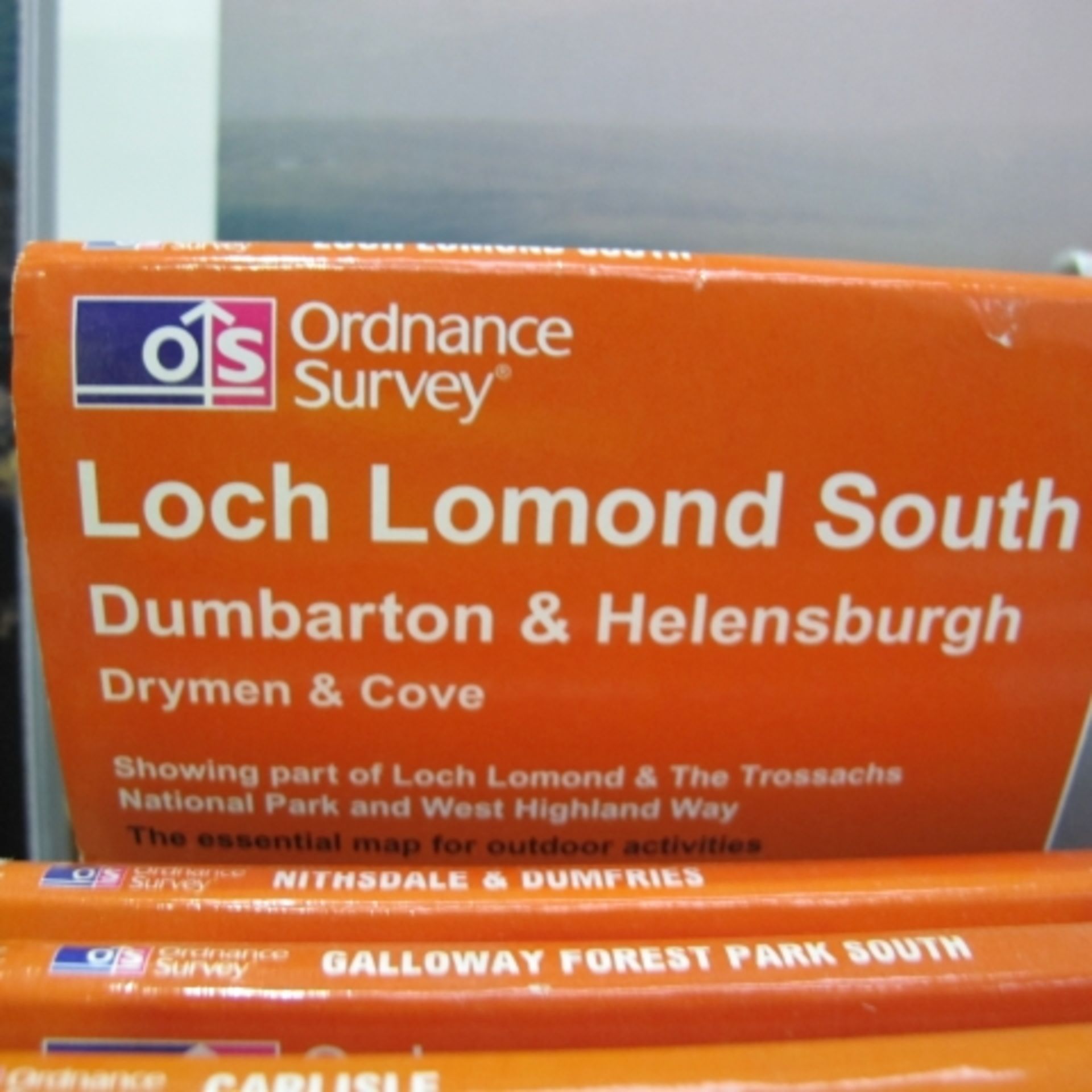 2 x Bespoke Display stands with a lower integral shelf for Ordnance Survey Maps, on castor wheels. - Image 4 of 11