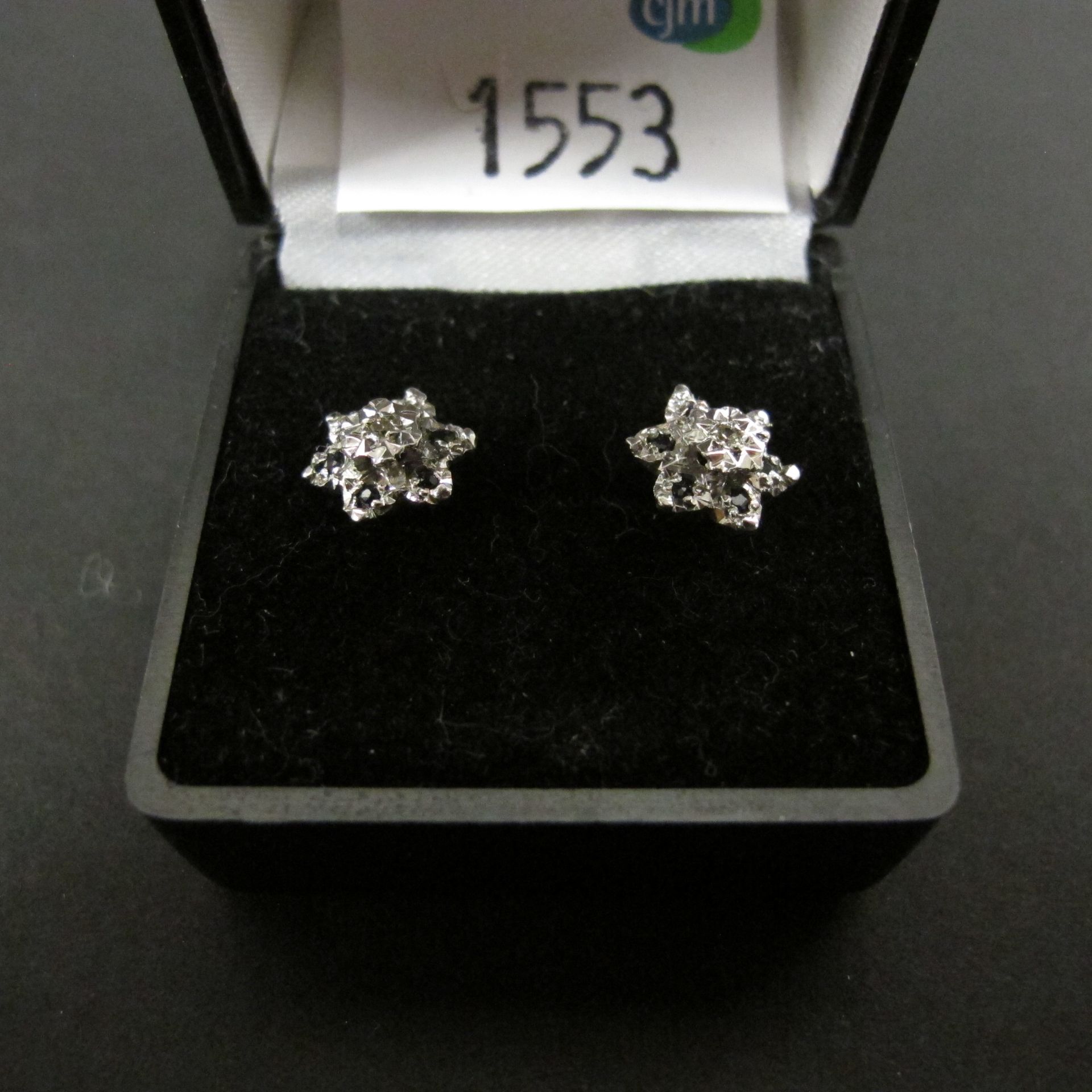 Pair of 9ct gold, diamond and sapphire stud earrings (est £30-£60)