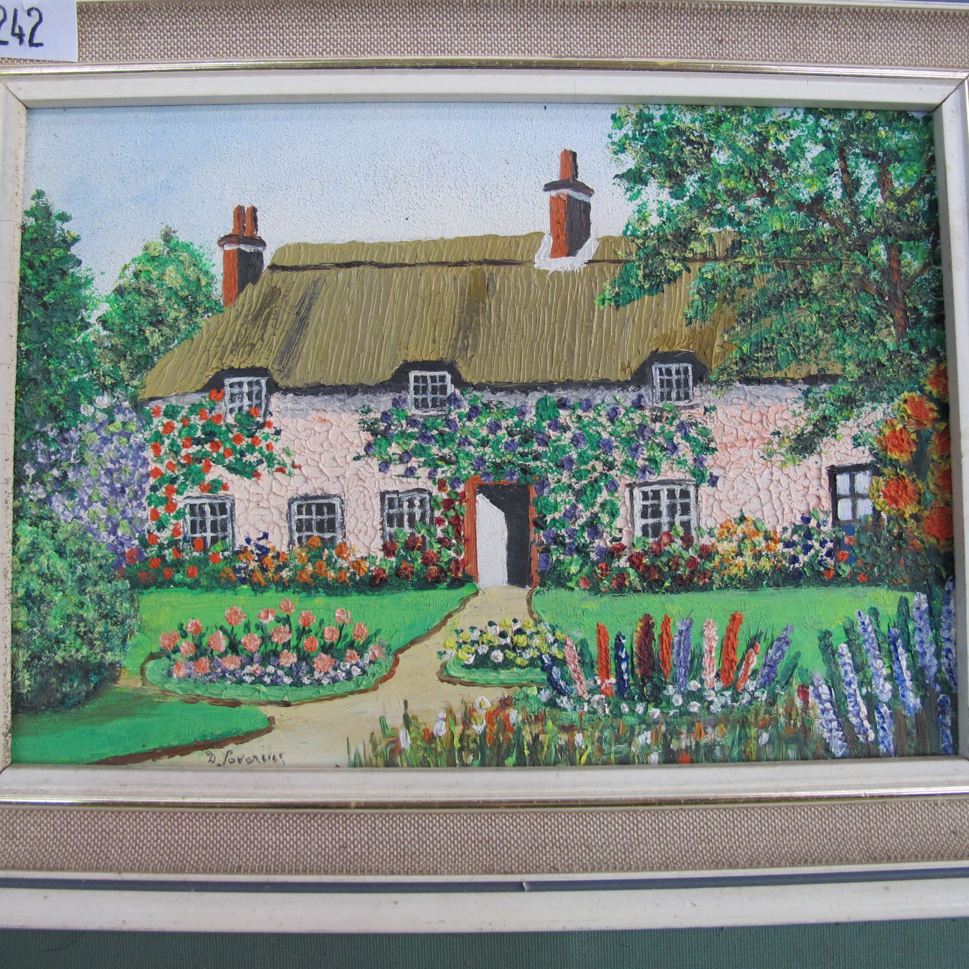 An original oil on board of Thatched Country Cottage, 13cm x 19cm (framed), three black and white