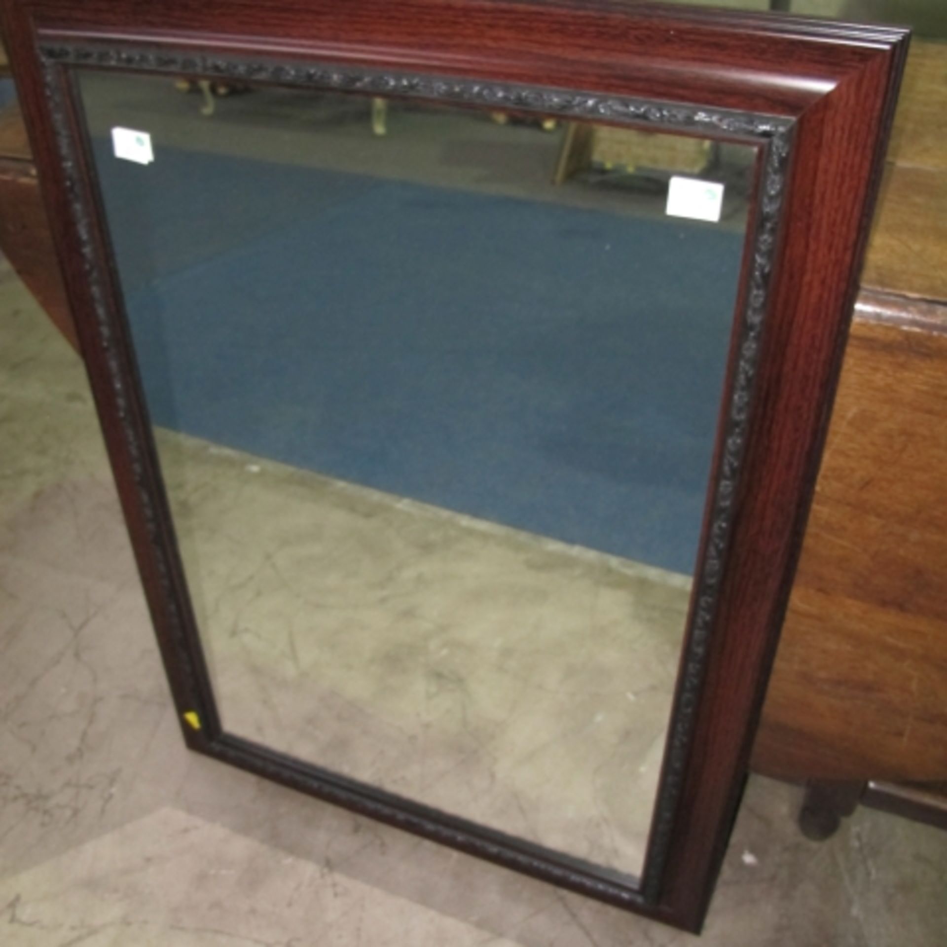 A dark wooden framed plain mirror, 63cm x 89cm (est £20-£40) - Image 2 of 2