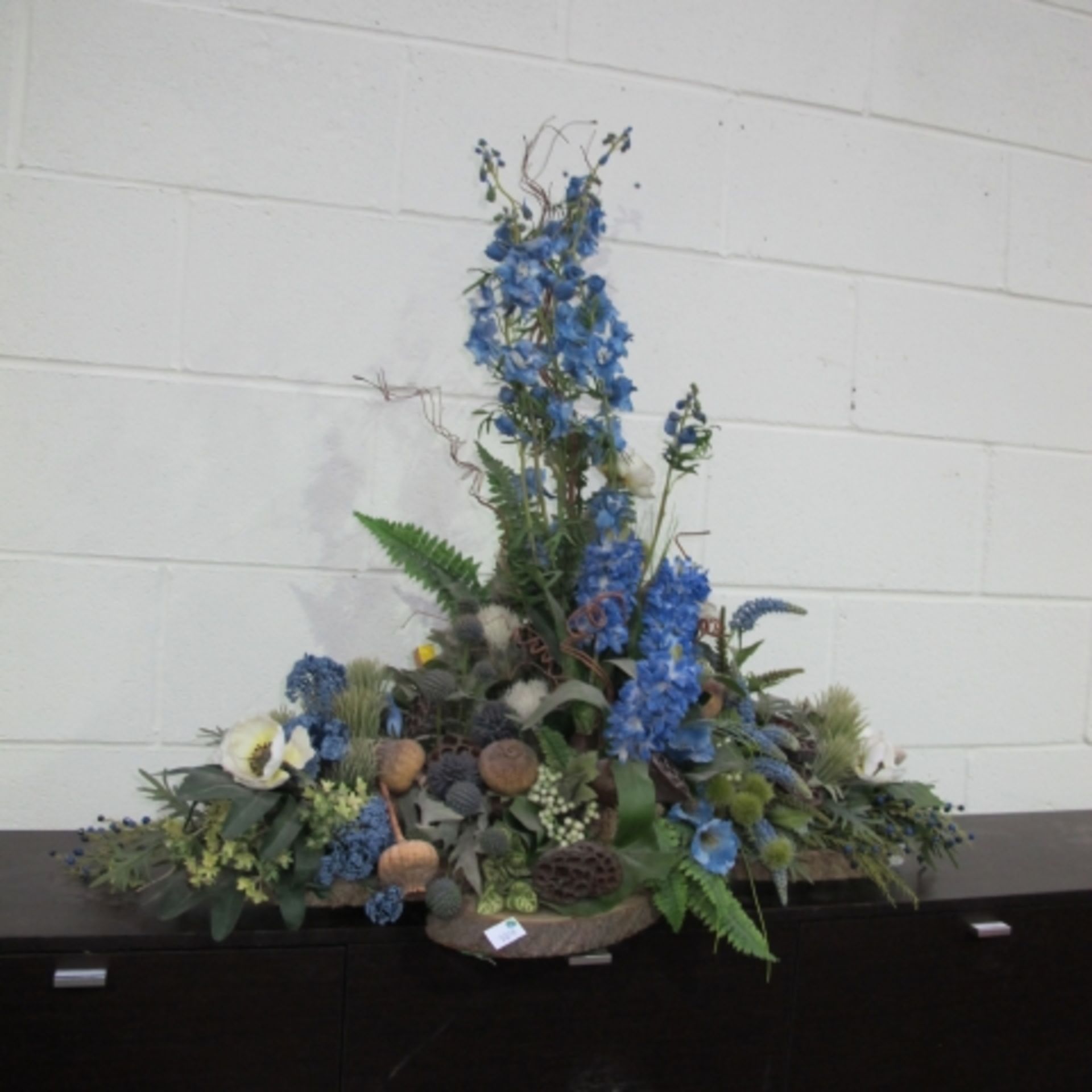 Four artificial Flower displays of various forms and designs (one features  3 new pillar candles) - Image 4 of 4