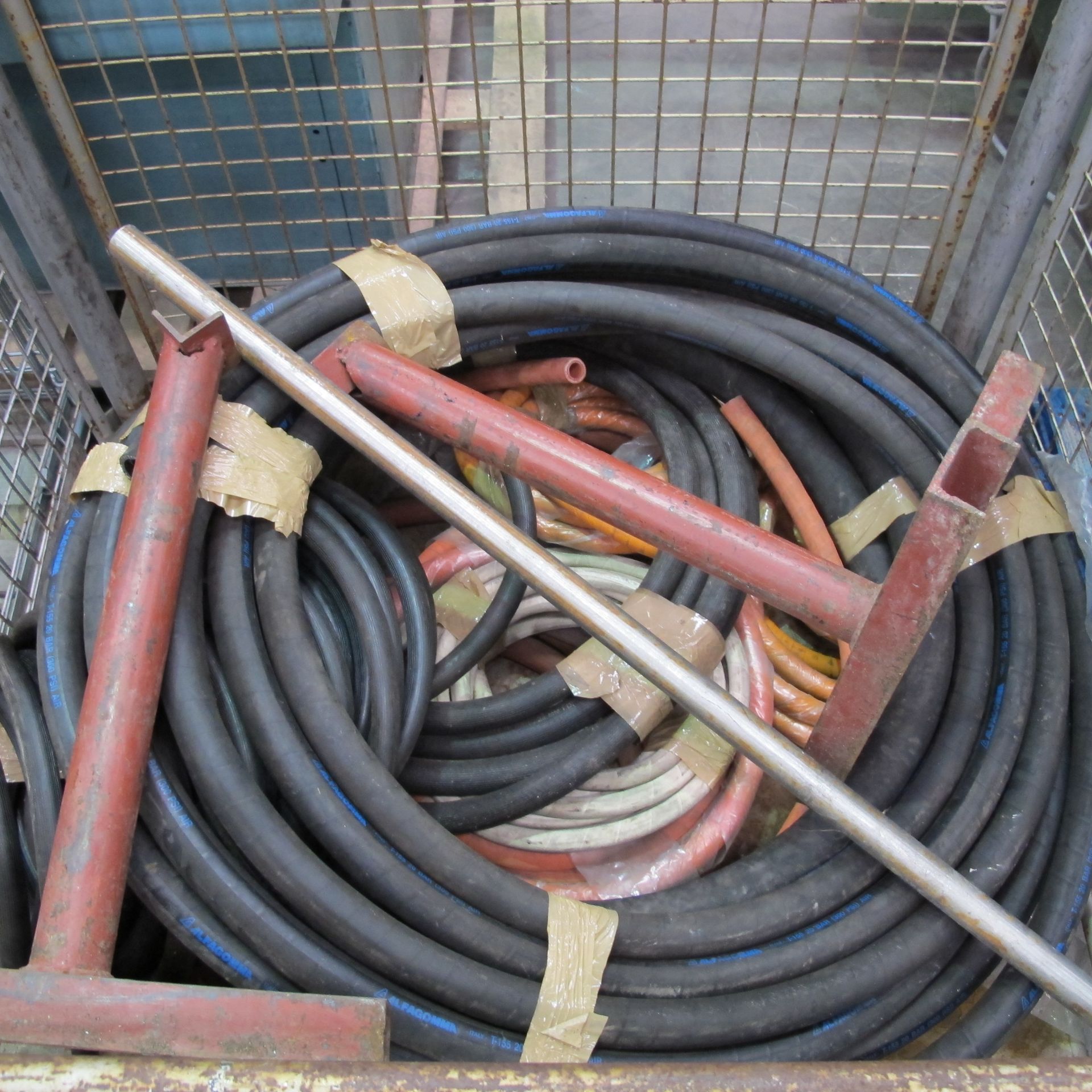 A stillage to include Alfagoma Pipe, various other hydraulic pipe, pipe reel holder etc. Stillage