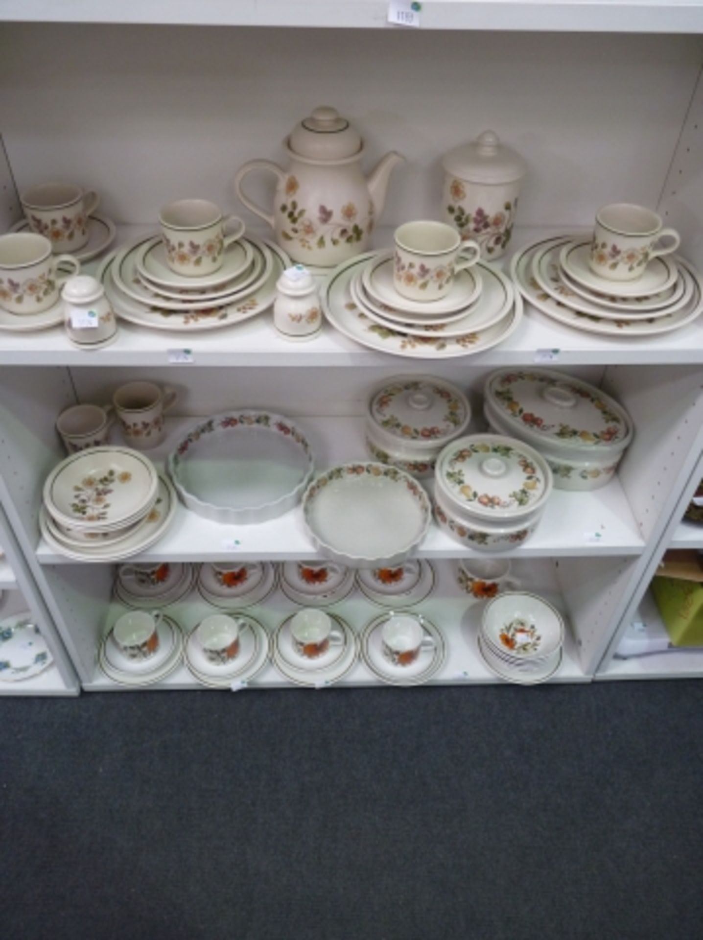 A lot containing sixty pieces of ceramic tableware, Includes items such as condiment holders,