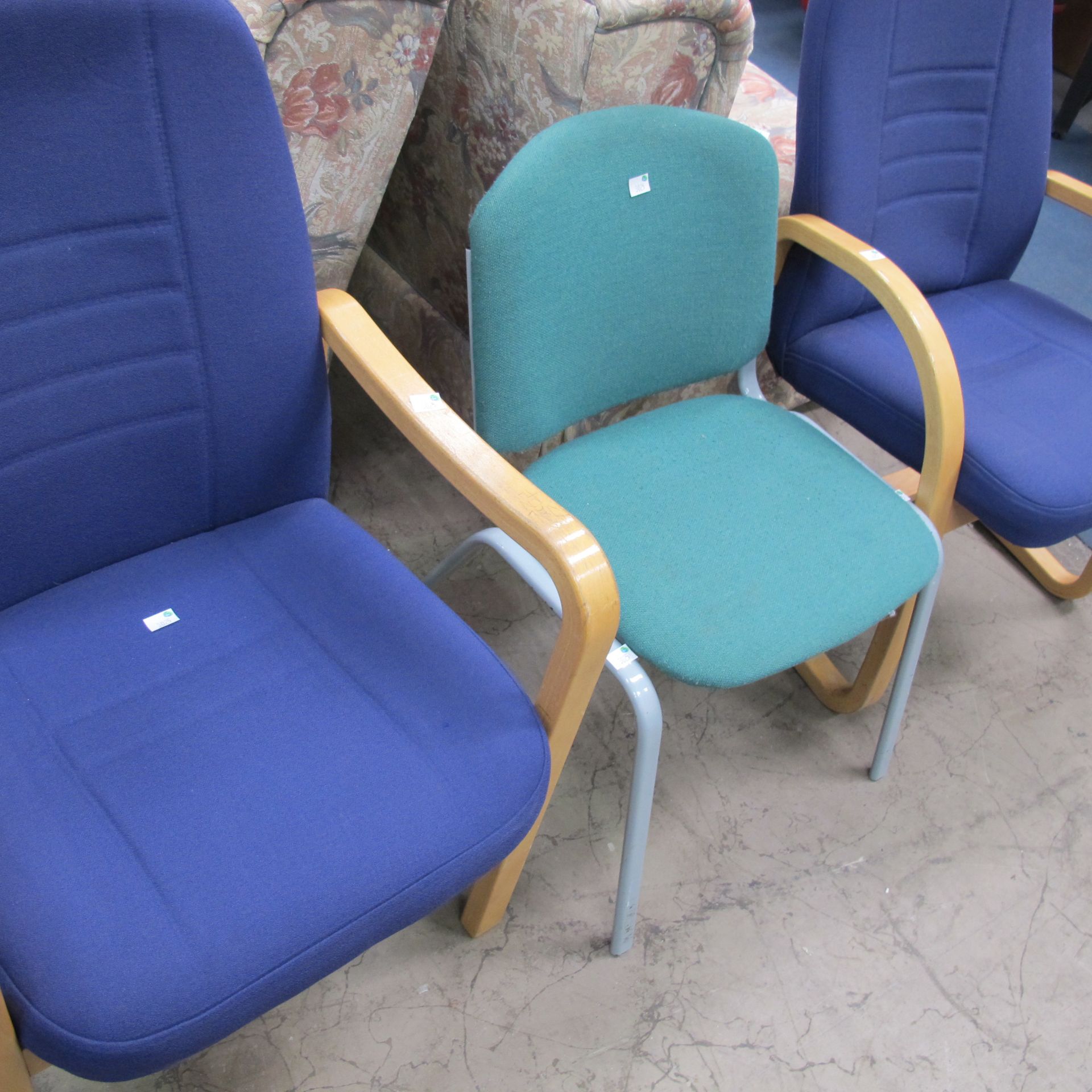 * A lot to contain 2 x similar blue waiting room chairs with wooden legs and arm rests, and a