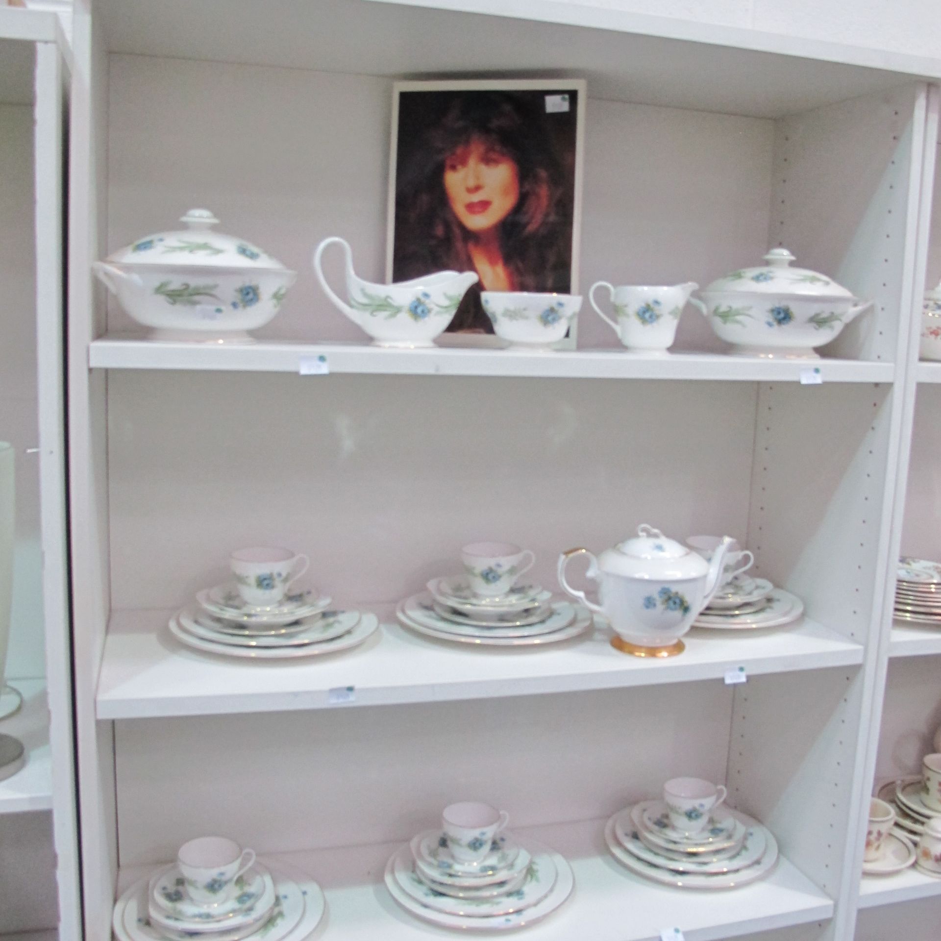 A lot containing 57 pieces of Shelley ceramic tableware. Includes items such as tureens, cups and