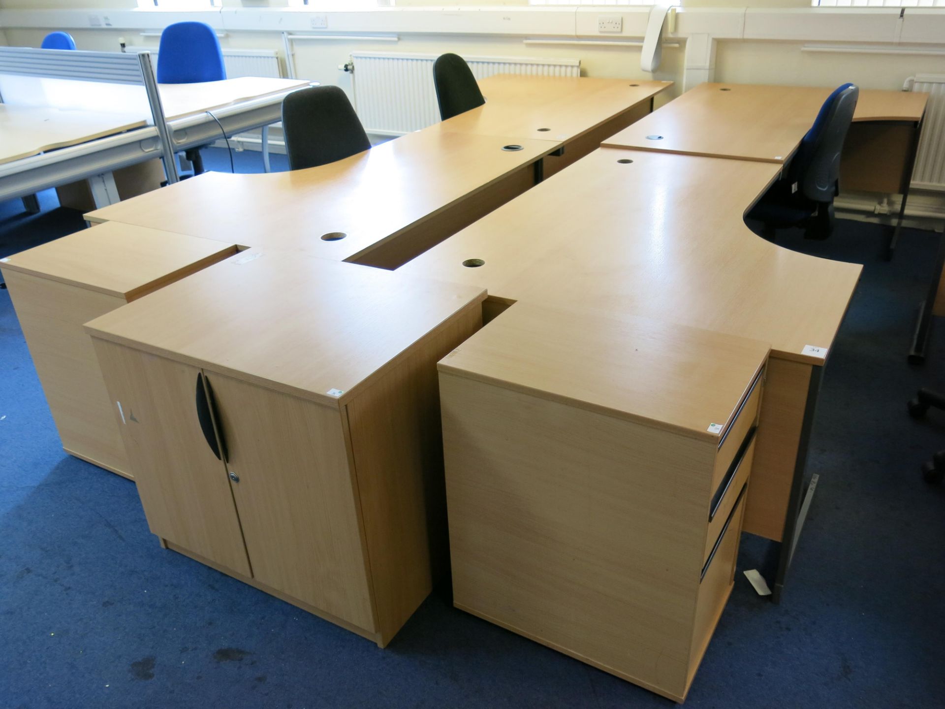 * 4 x L-shaped desks, 2 x pedestal drawer units, 2 x charcoal operators chairs, a blue chair and a