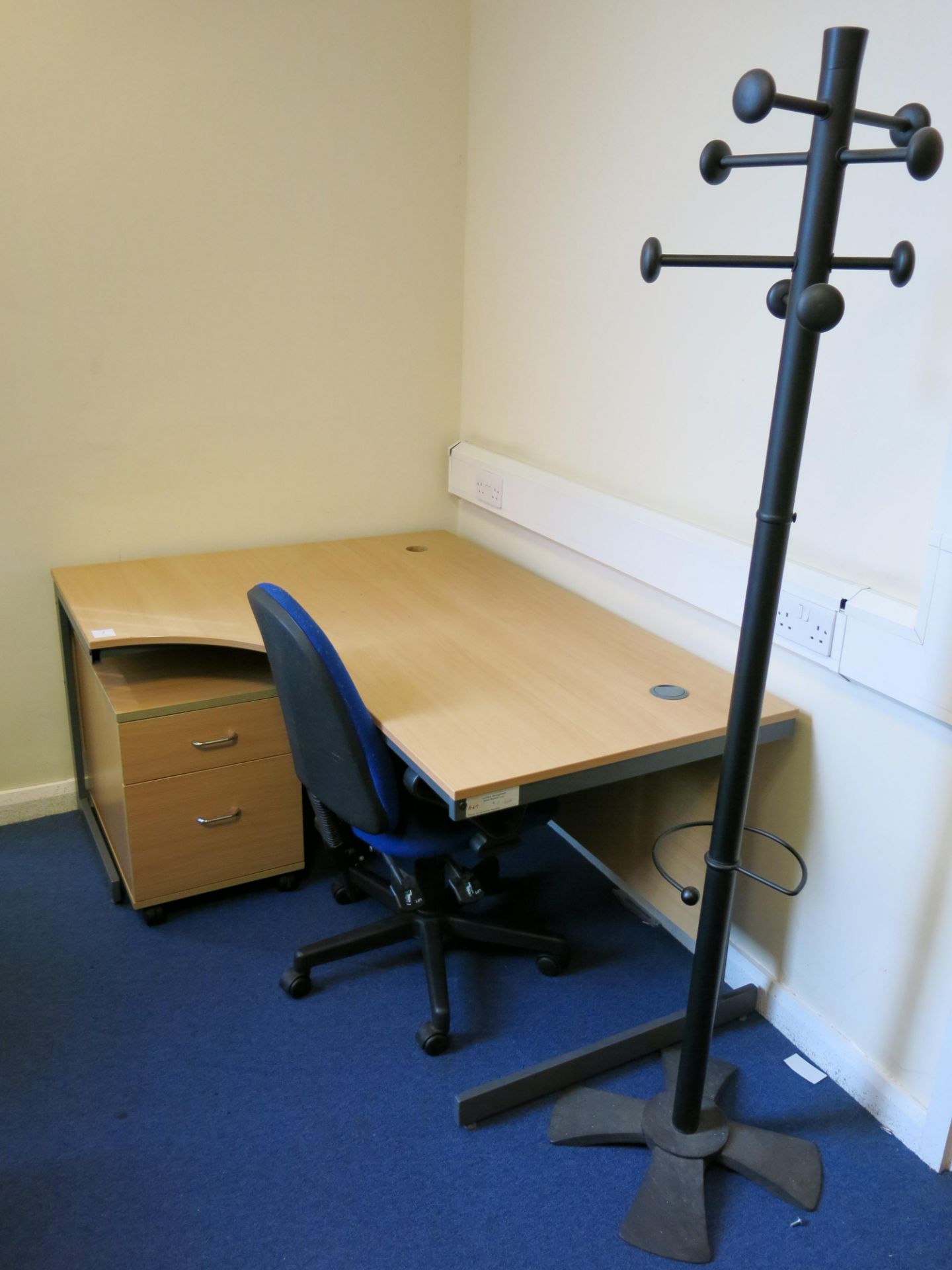 * L-shaped desk, 2 x blue operators chairs, a three drawer pedestal unit and a coat stand