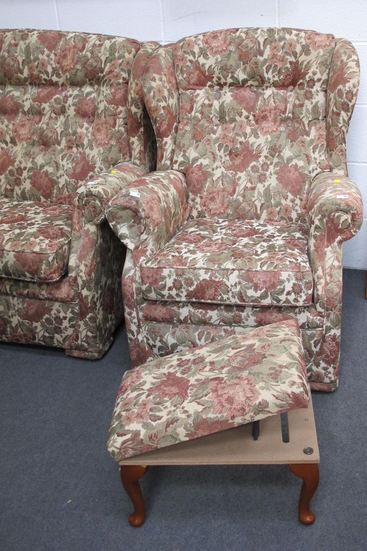 A fabric covered three piece suite - a two seat settee & two wing back armchairs all with floral - Image 2 of 5