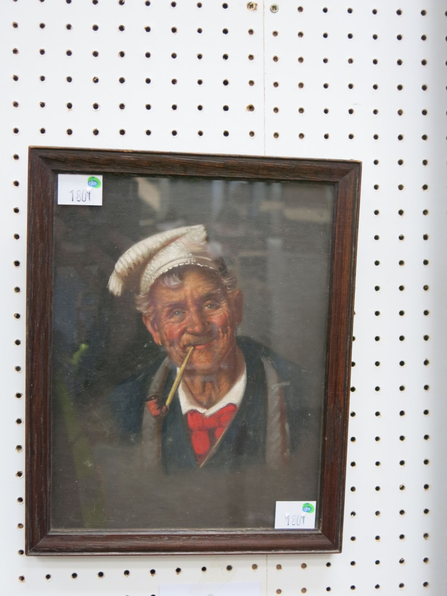 An Italian? oil on canvas of a cheery old man in a hat smoking a pipe, in a plain wooden frame. 25cm