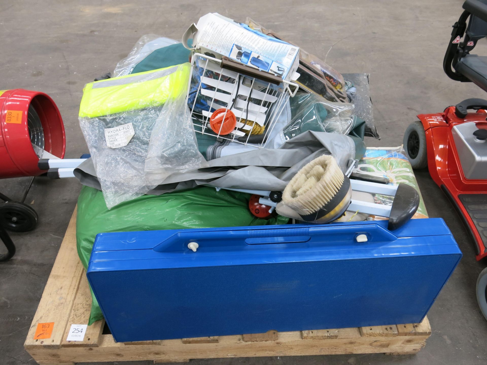 A pallet to include various items of camping equipment etc. Please note there is a £10 + VAT Lift