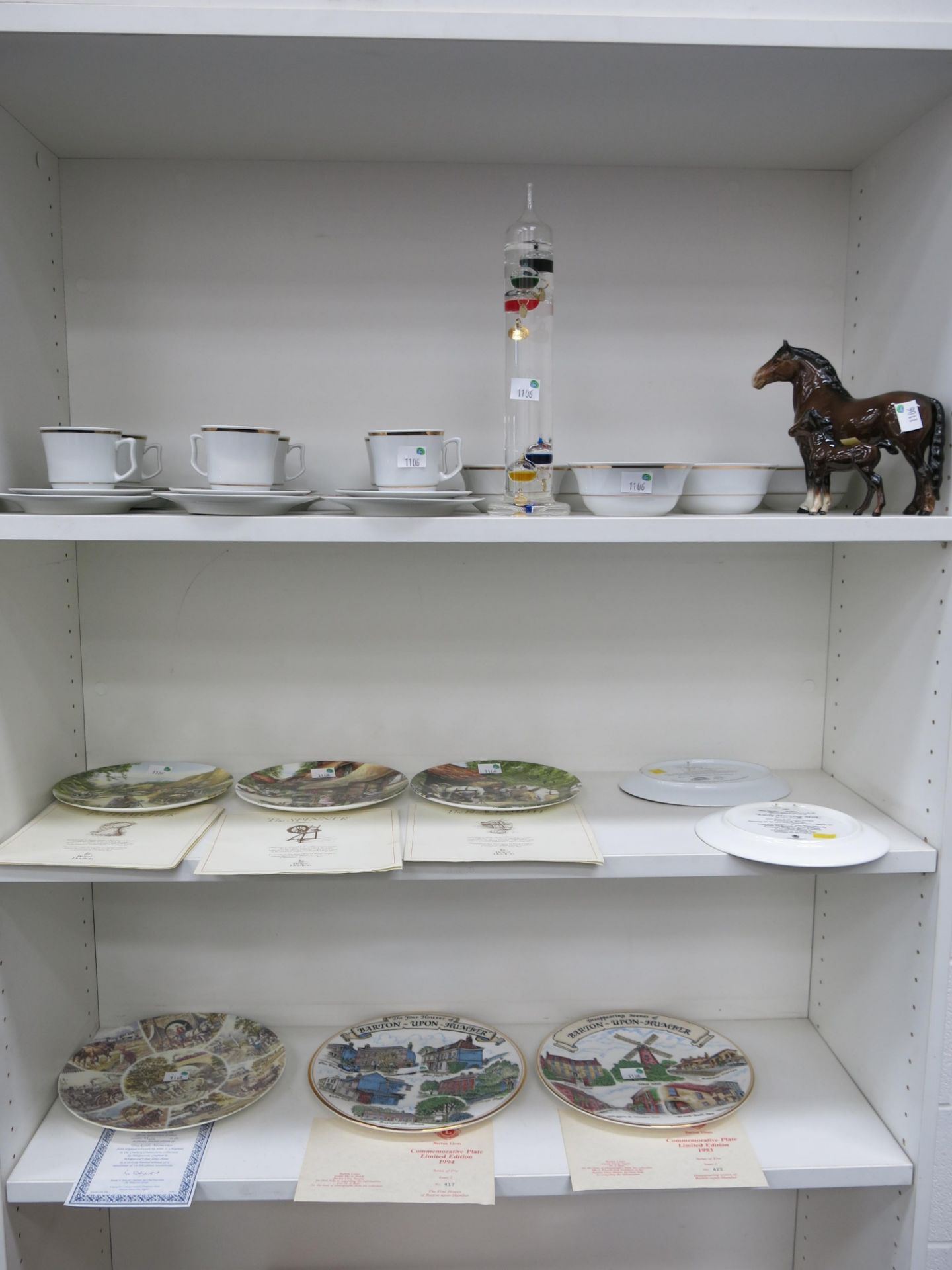 A collection of six cups, saucers, side plates & bowls made by JL Menau in the G.D.R together with a