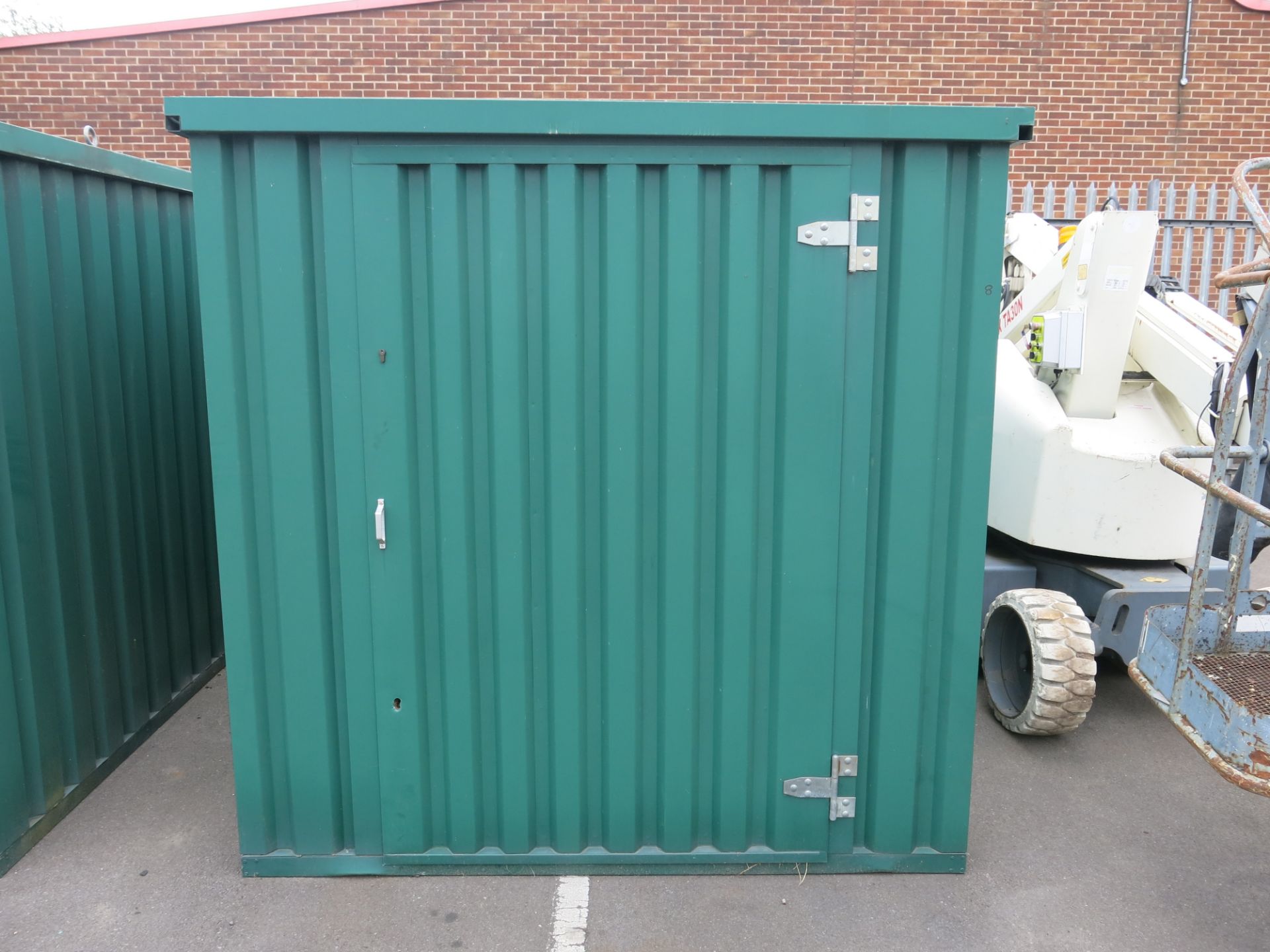 * Steel storage container with single door to the front c/w lifting points, wooden floor. H2.1m,